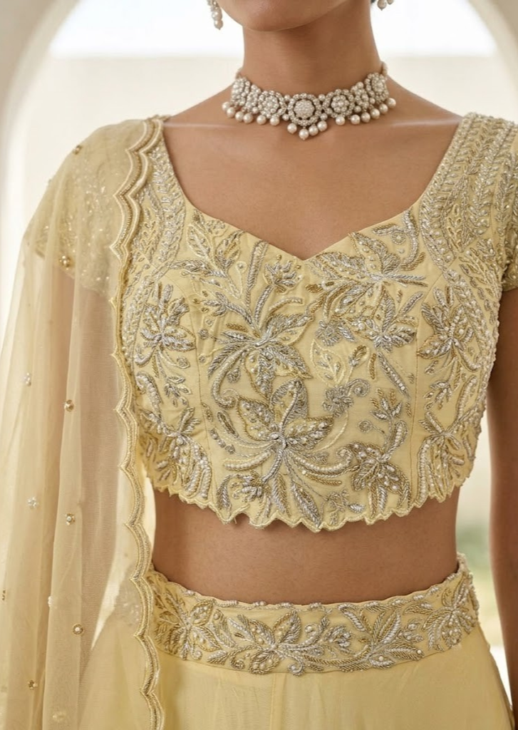 YELLOW EMBROIDERED LEHENGA BLOUSE WITH DUPATTA.