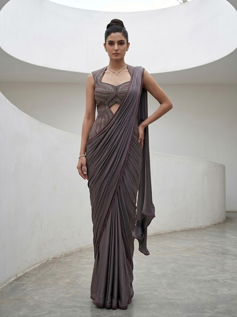 GREY SEQUIN AND EMBELLISHED PRE-DRAPED SAREE WITH DESIGNER CUT-OUT BLOUSE.
