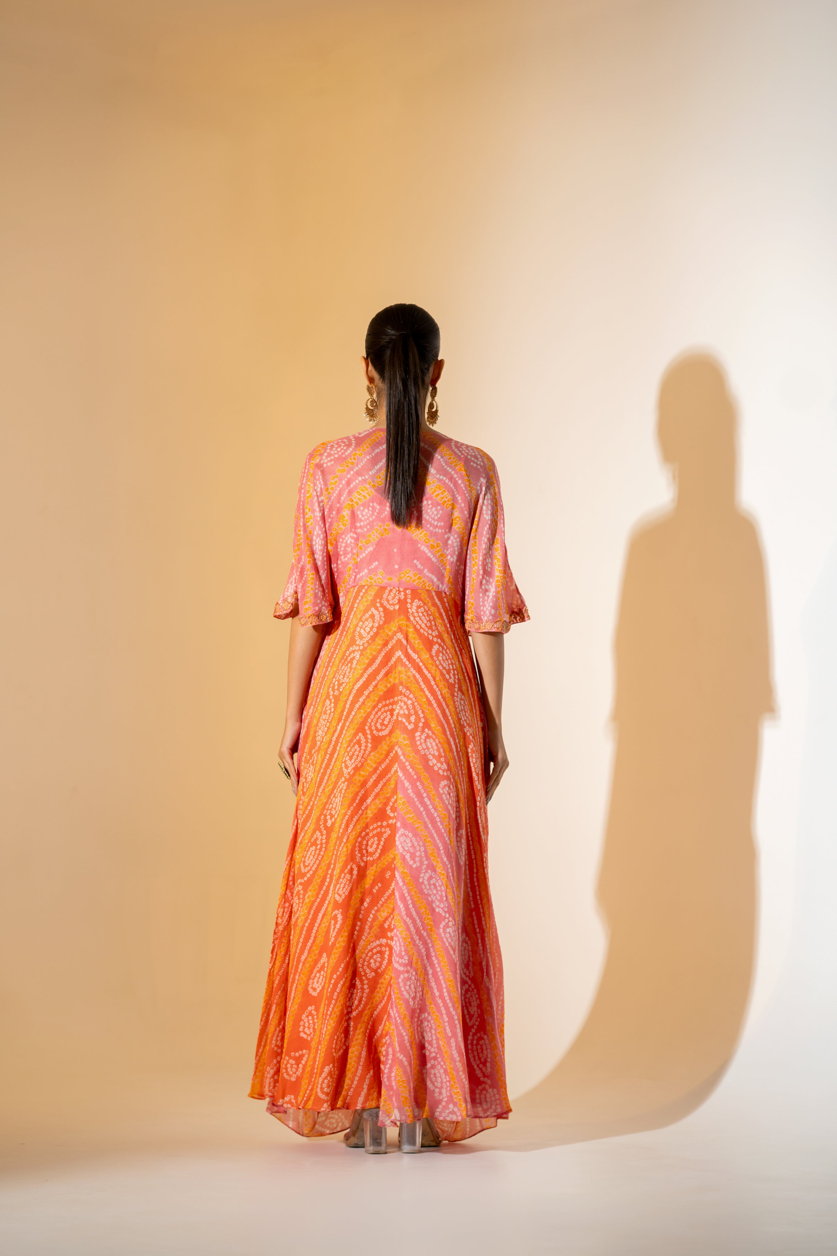 BANDHANI COWL DRESS IN SUNSET ORANGE & PINK.