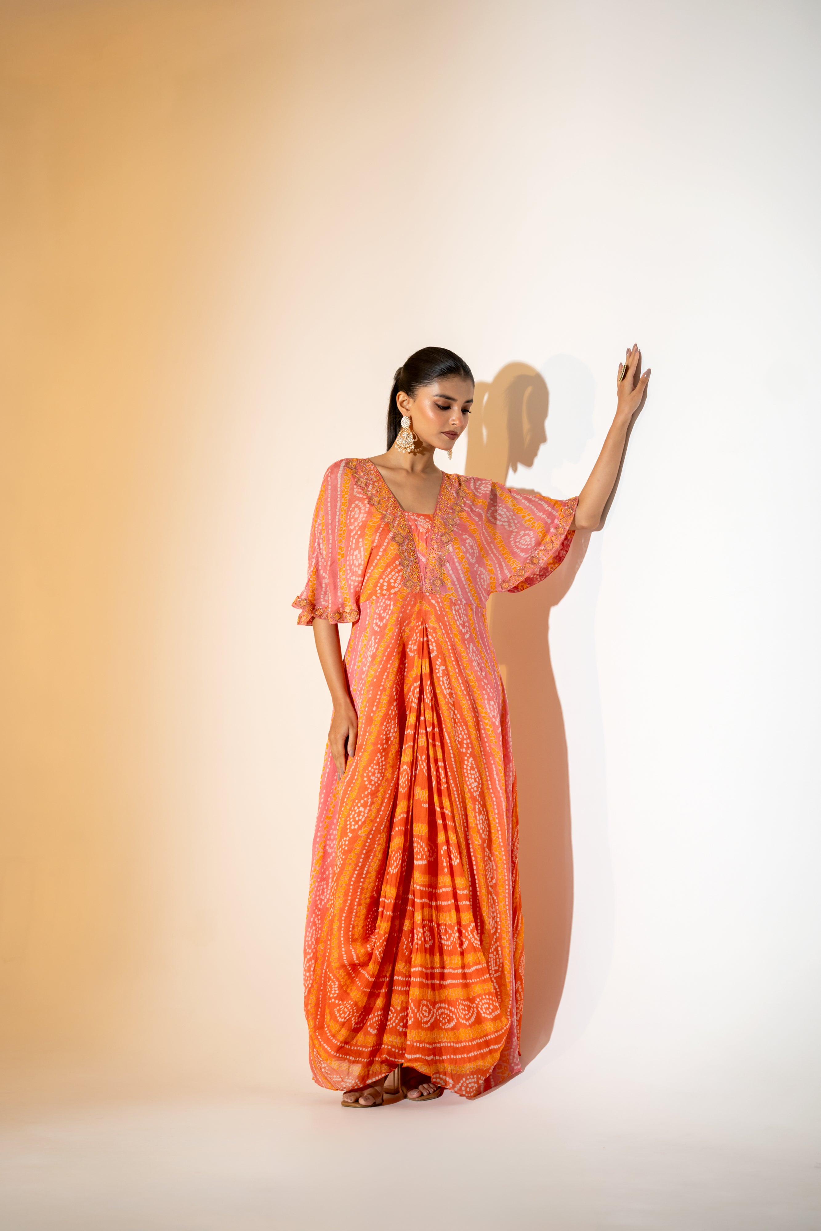 BANDHANI COWL DRESS IN SUNSET ORANGE & PINK.