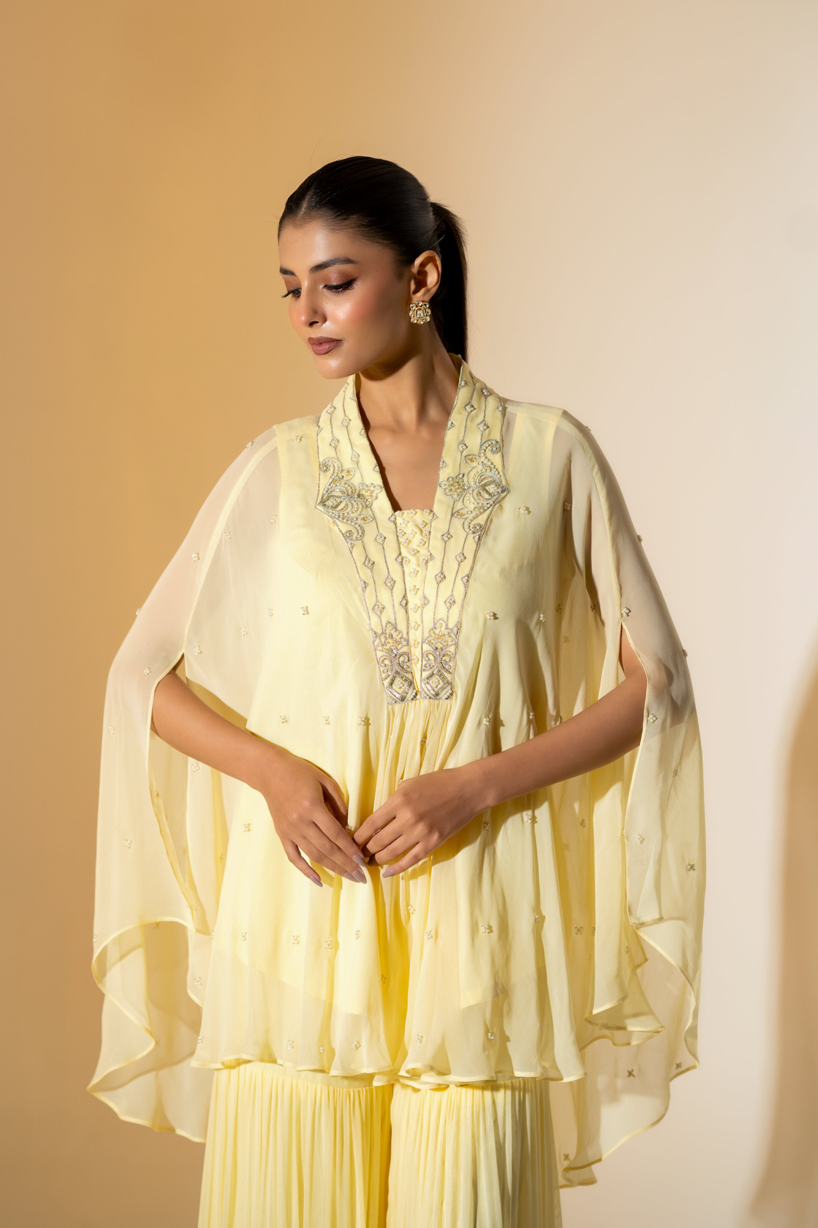 BUTTER YELLOW SHARARA SET WITH PEARL DETAILING & EMBROIDERED NECKLINE.