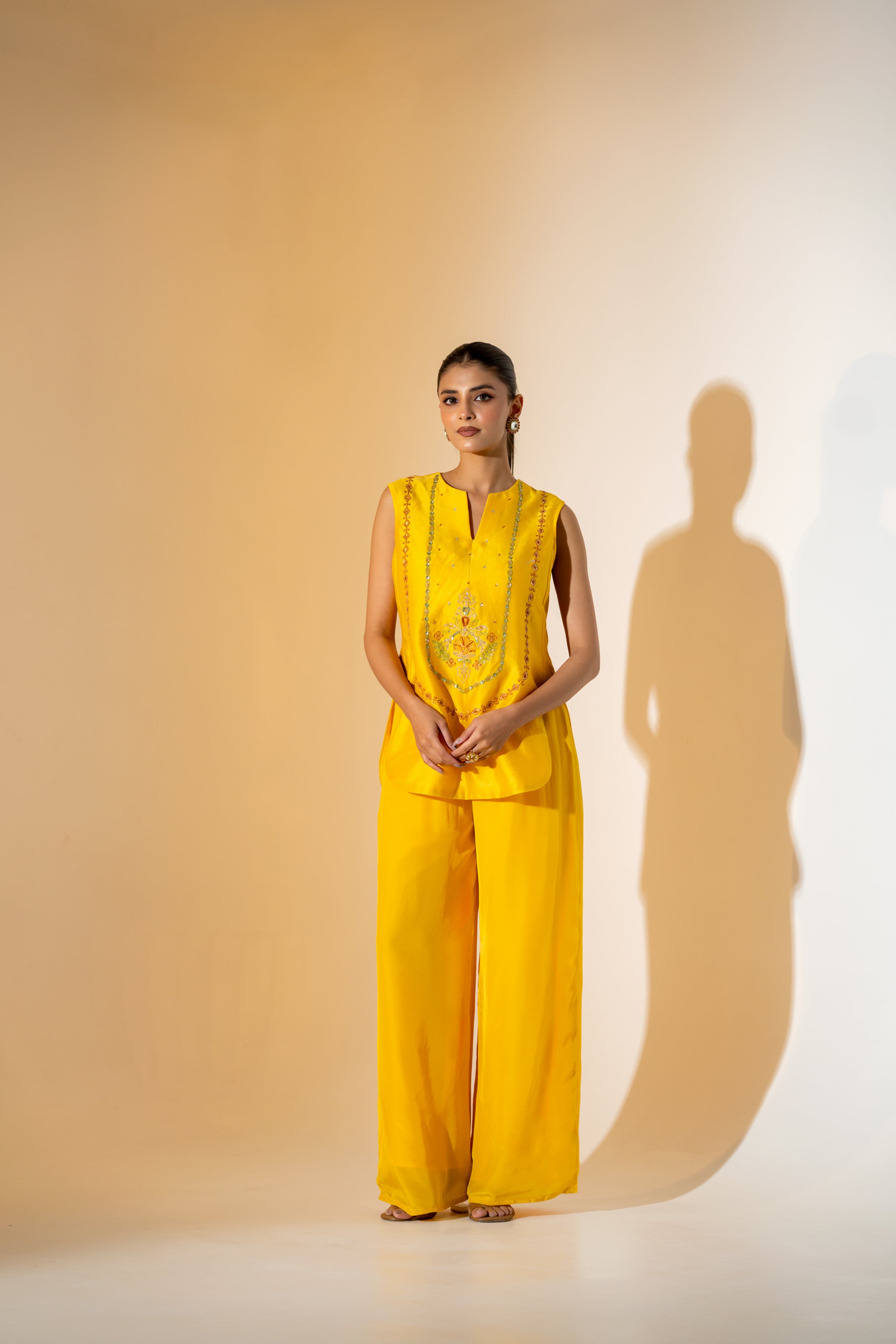 SUNNY YELLOW CO-ORD SET WITH  CONTRASTING GREEN FESTIVE EMBROIDERY.