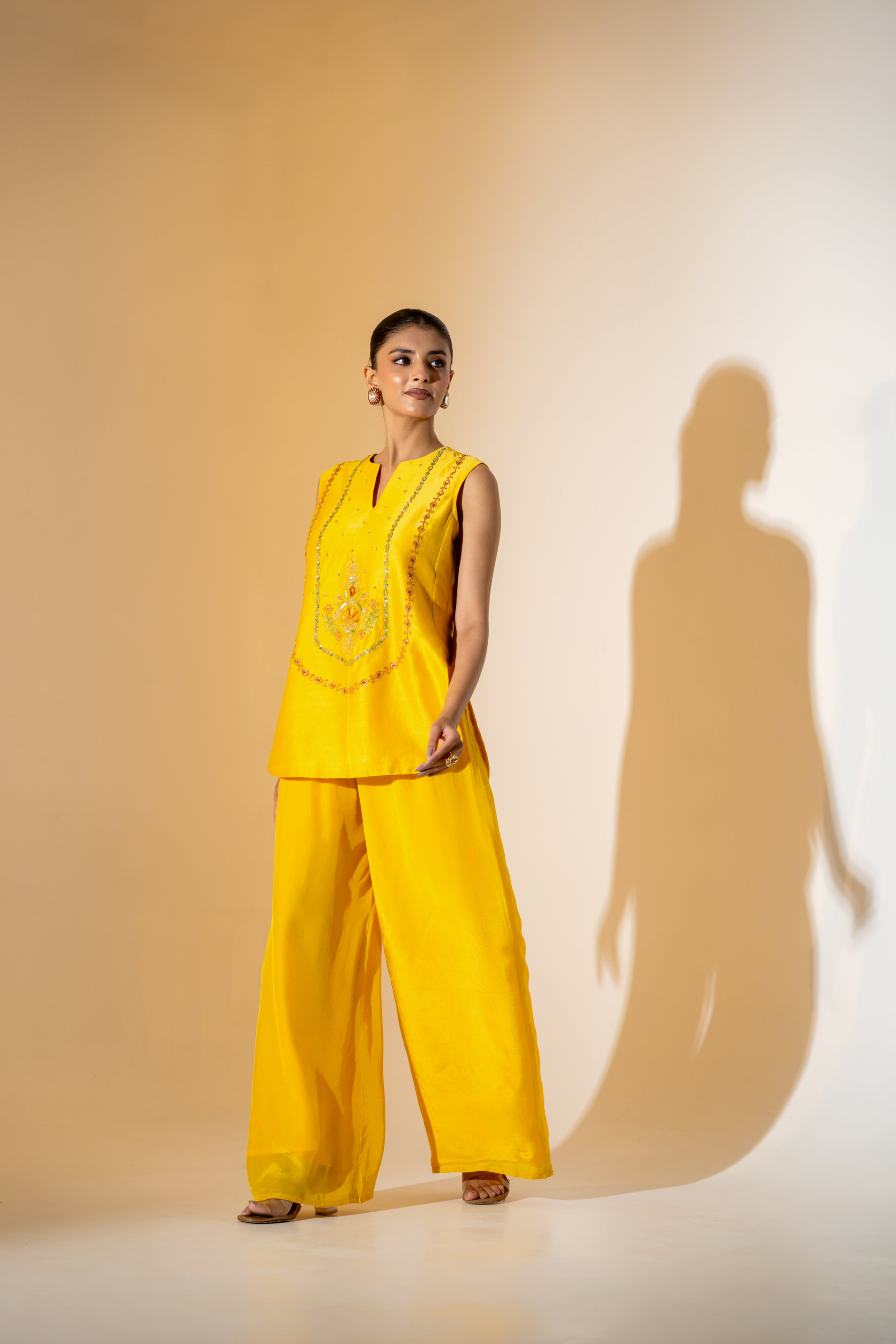 SUNNY YELLOW CO-ORD SET WITH  CONTRASTING GREEN FESTIVE EMBROIDERY.