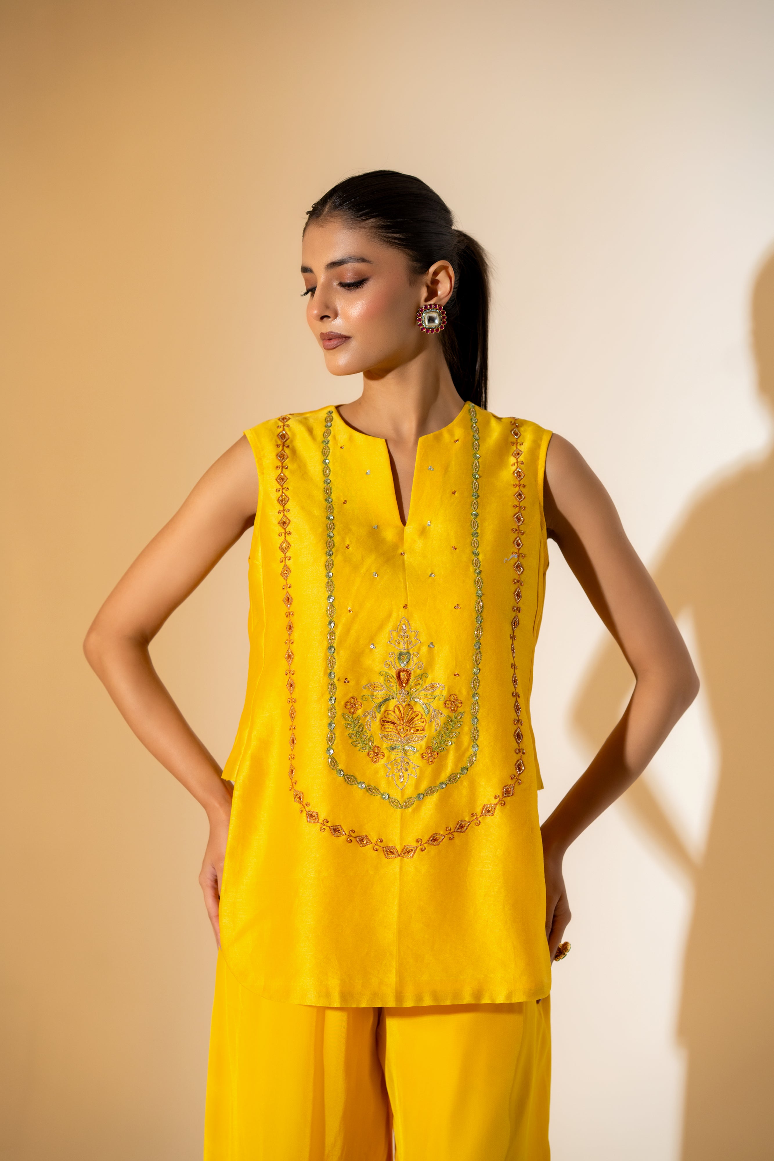 SUNNY YELLOW CO-ORD SET WITH  CONTRASTING GREEN FESTIVE EMBROIDERY.