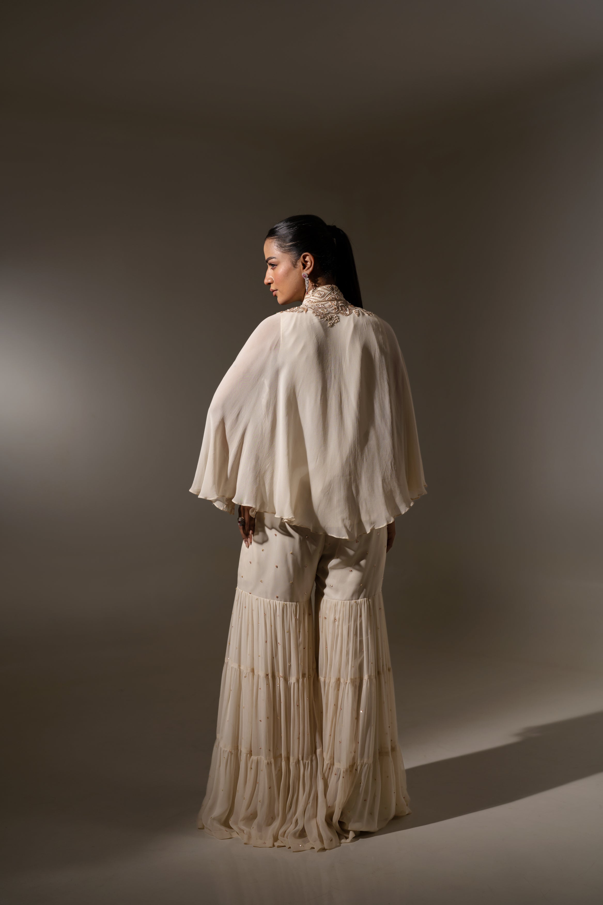 SHARARA WITH INNER SET & PEARL DETAILING AND EMBROIDERED NECKLINE.