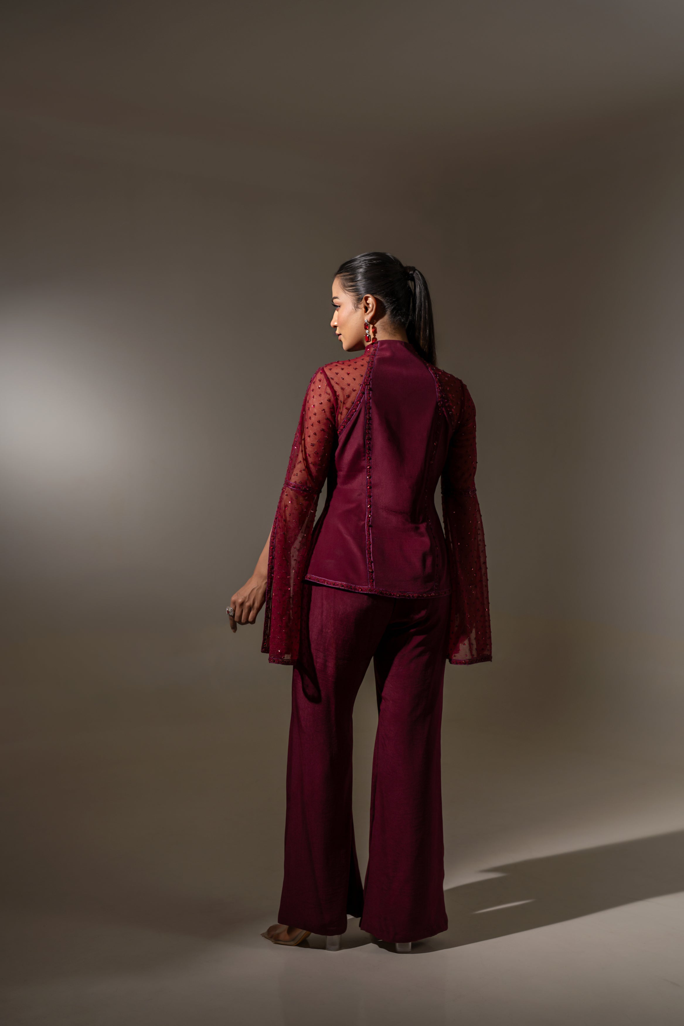 MAROON HAND-EMBROIDERED SHEER JACKET TOP WITH WIDE-LEG PANTS.