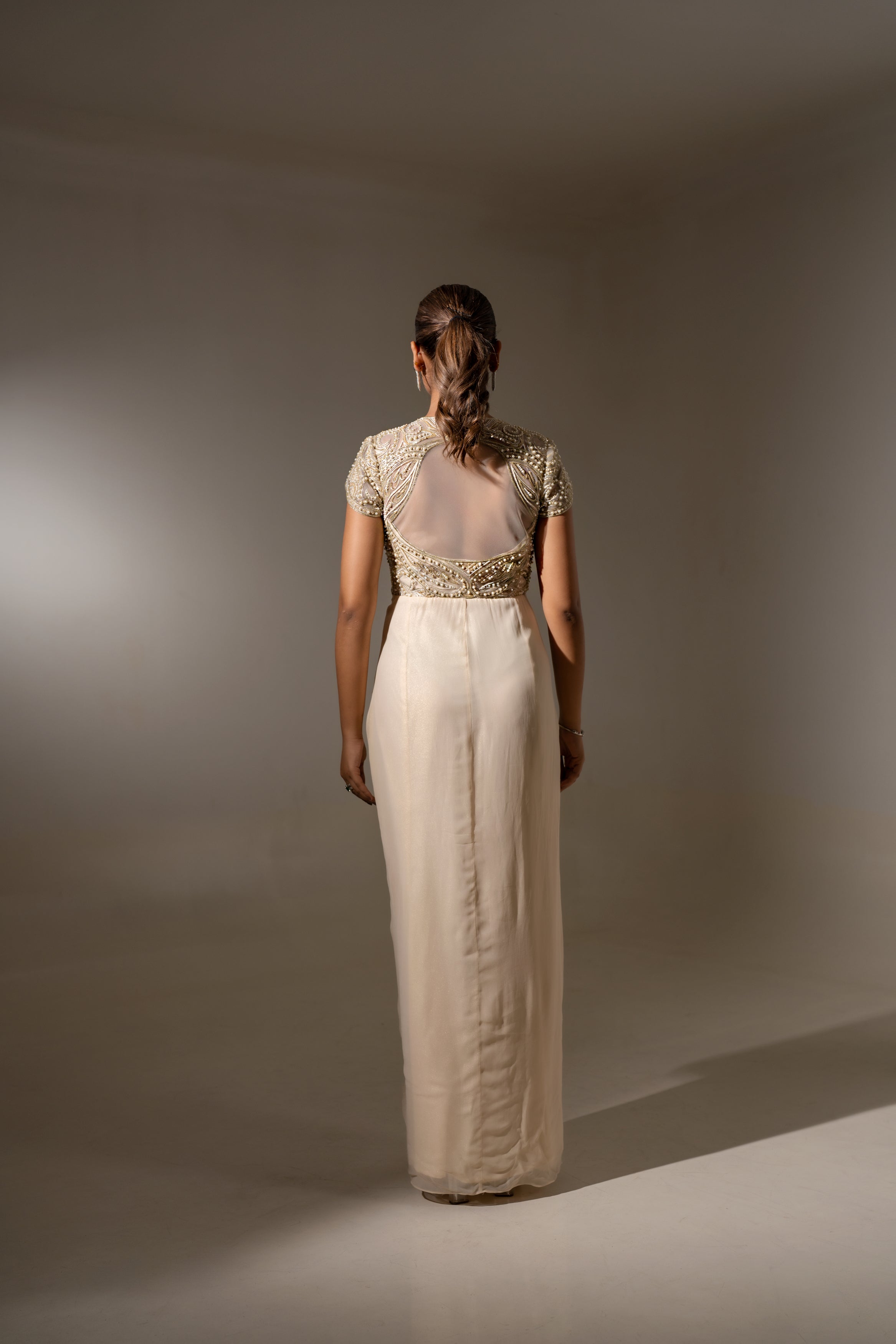 OFF WHITE DRAPED PEARL EMBROIDERED BACKLESS GOWN