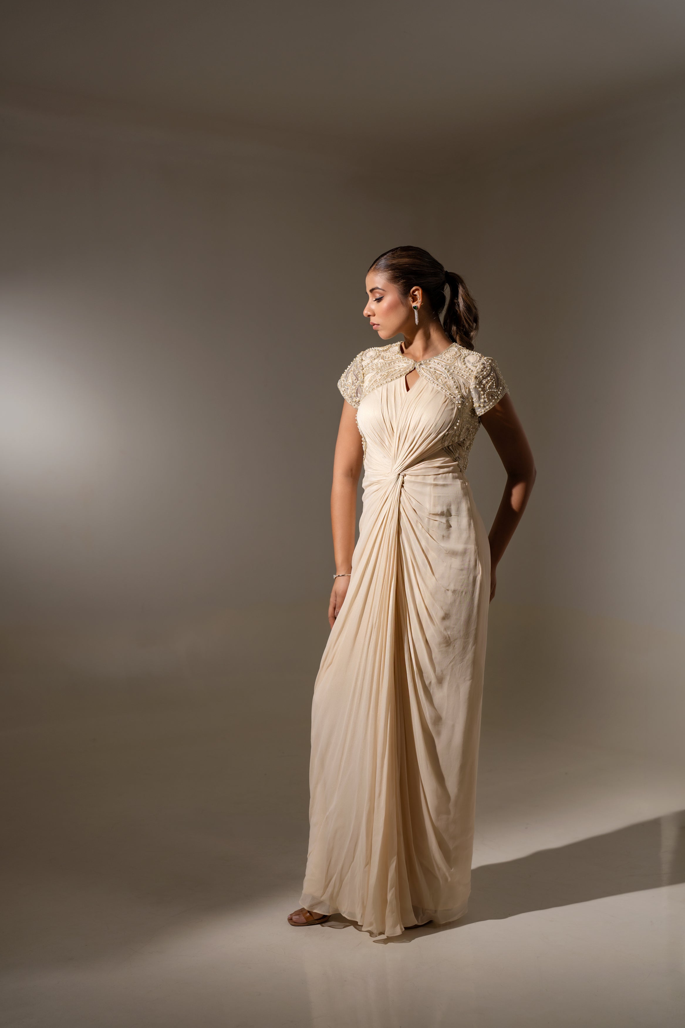 OFF WHITE DRAPED PEARL EMBROIDERED BACKLESS GOWN