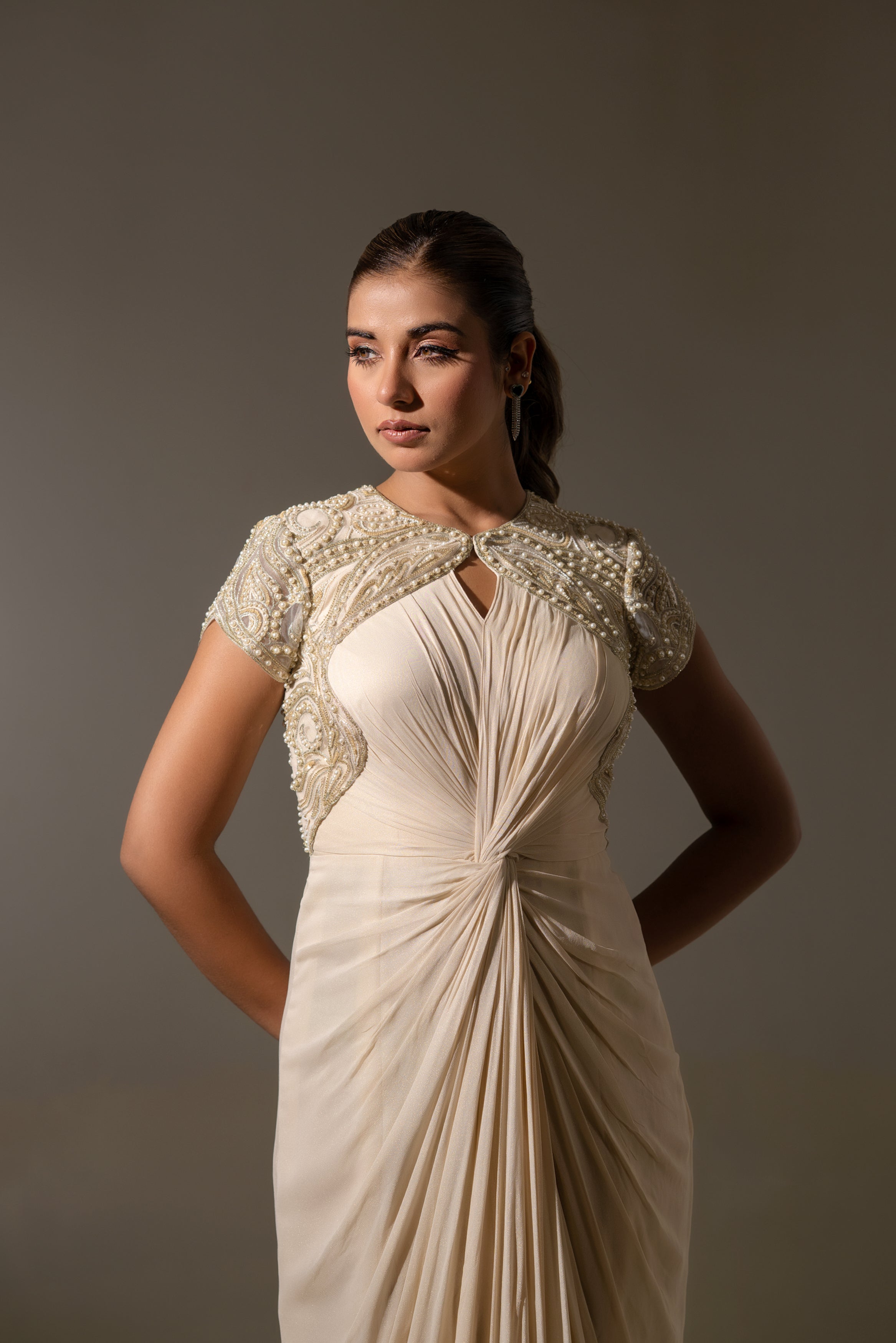 OFF WHITE DRAPED PEARL EMBROIDERED BACKLESS GOWN