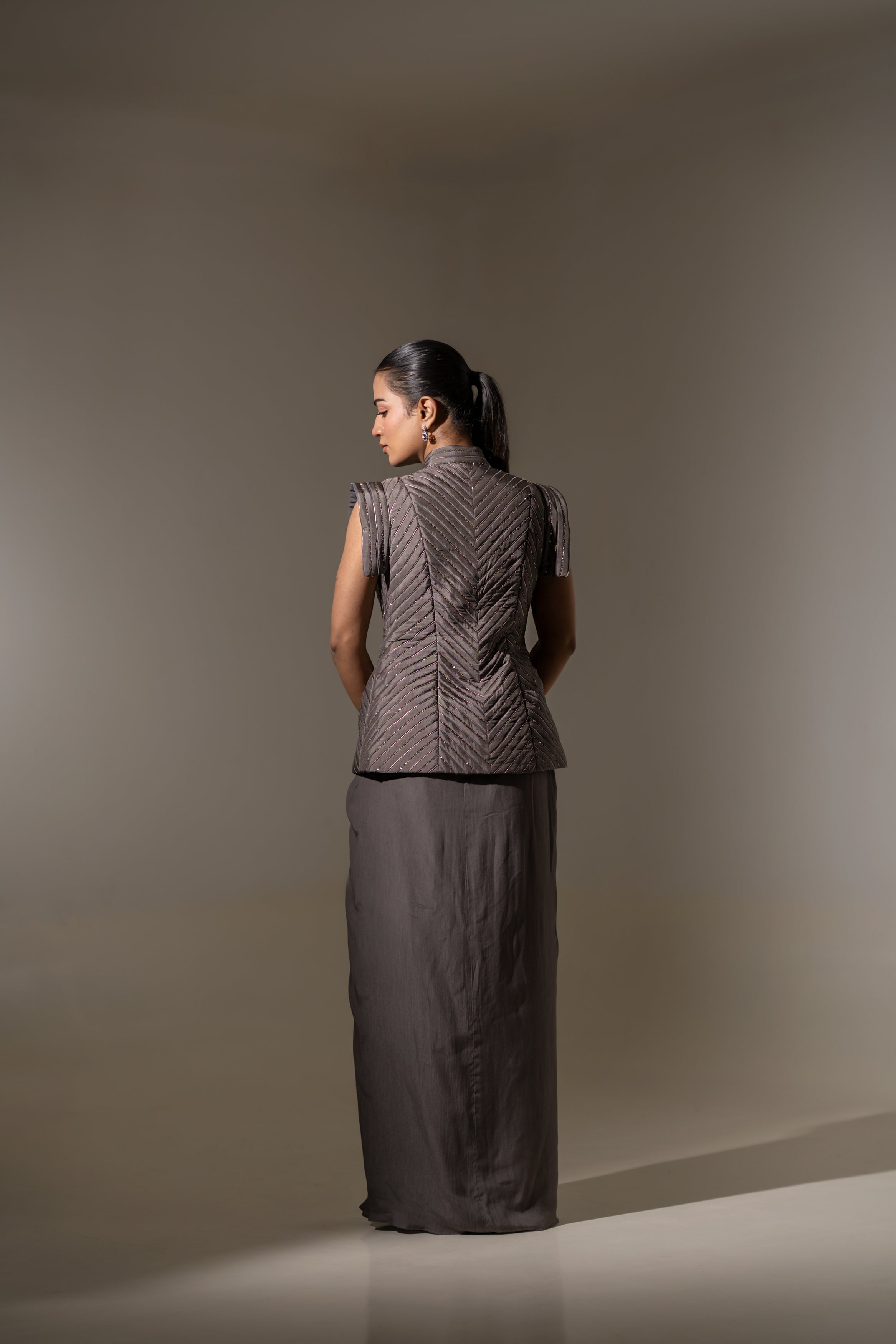 EMBROIDERED STRUCTURED JACKET WITH PLEATED SKIRT