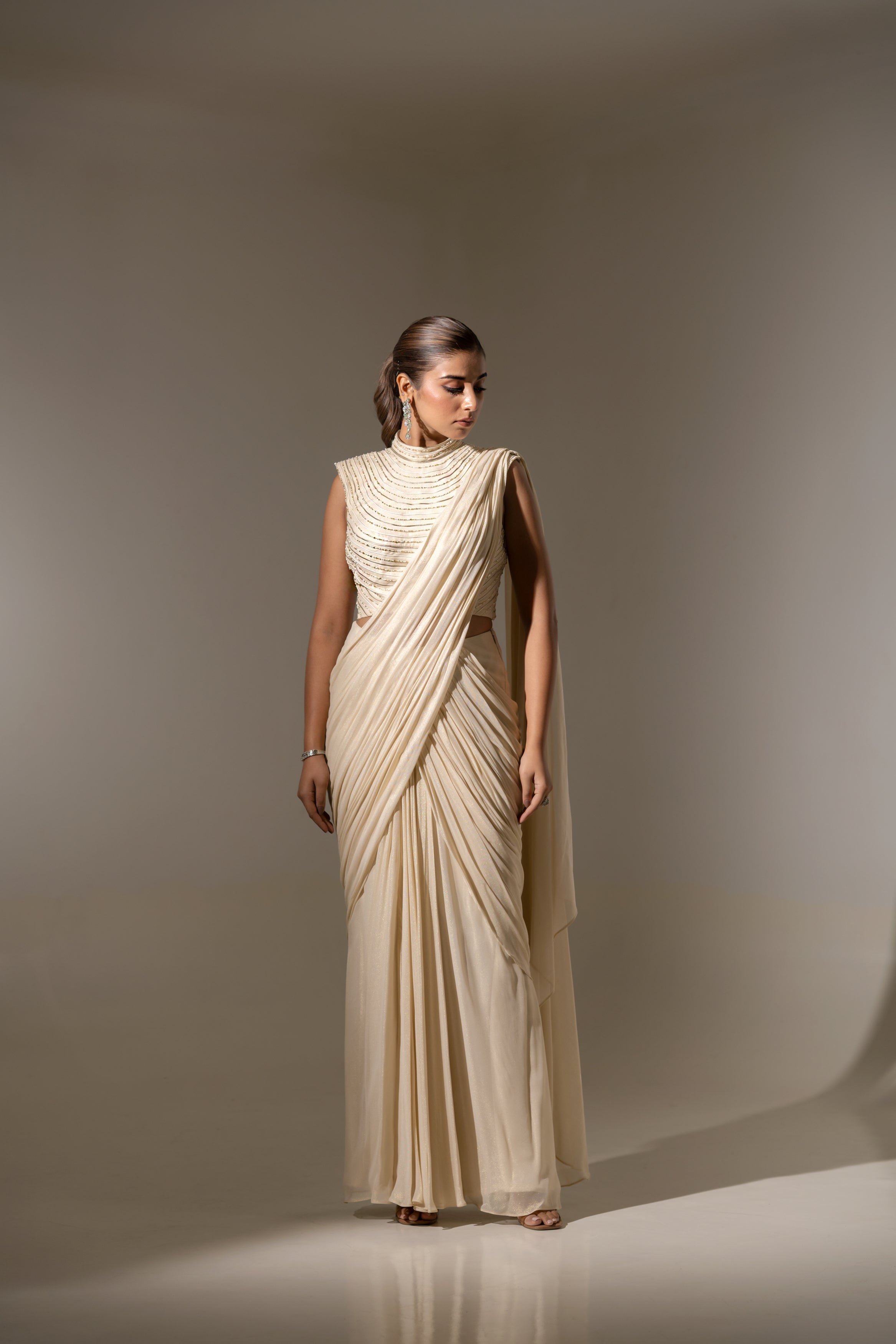 OFF WHITE DRAPE SAREE WITH HAND-EMBELLISHED DETAILING ON THE BLOUSE