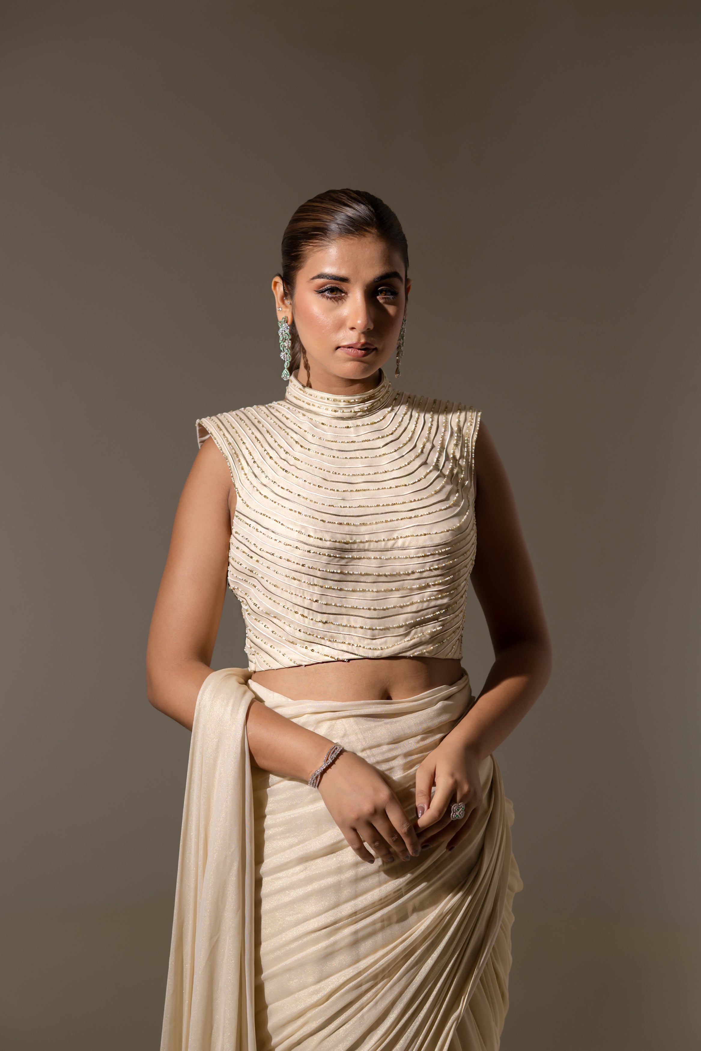 OFF WHITE DRAPE SAREE WITH HAND-EMBELLISHED DETAILING ON THE BLOUSE