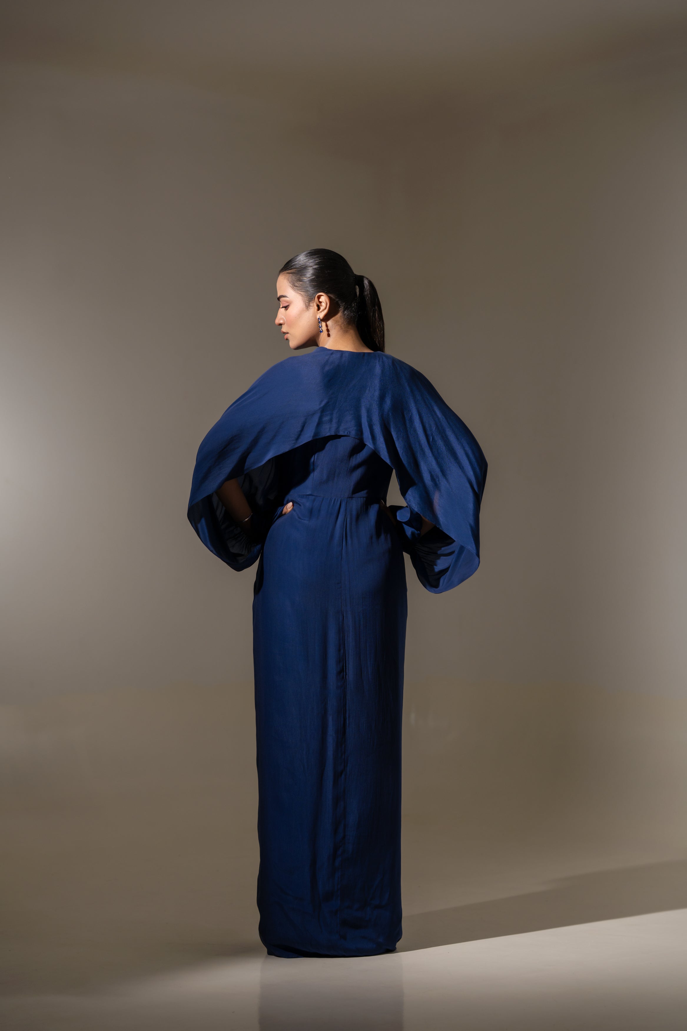 BLUE EMBELLISHED SHOULDER DRAPED GOWN