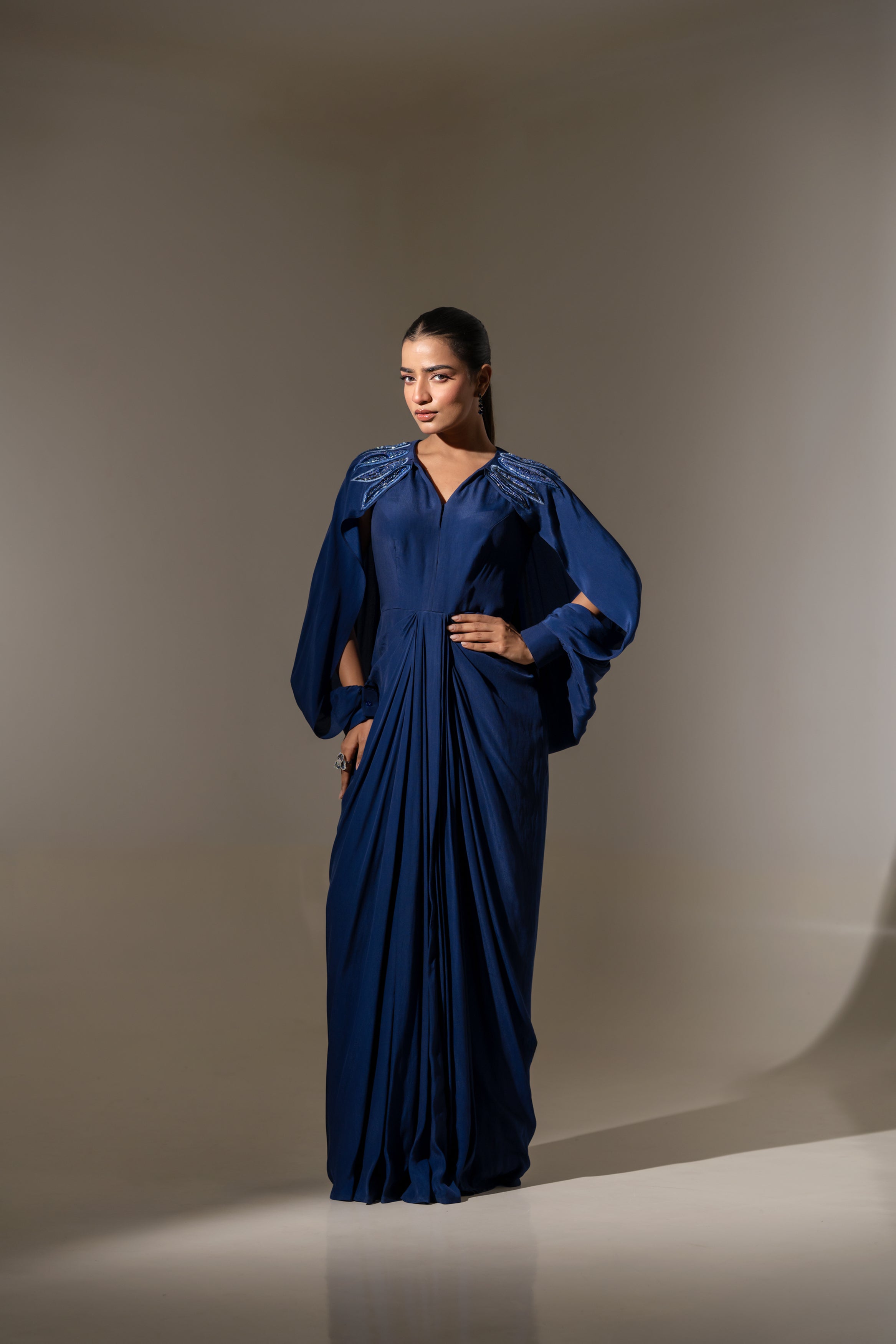BLUE EMBELLISHED SHOULDER DRAPED GOWN