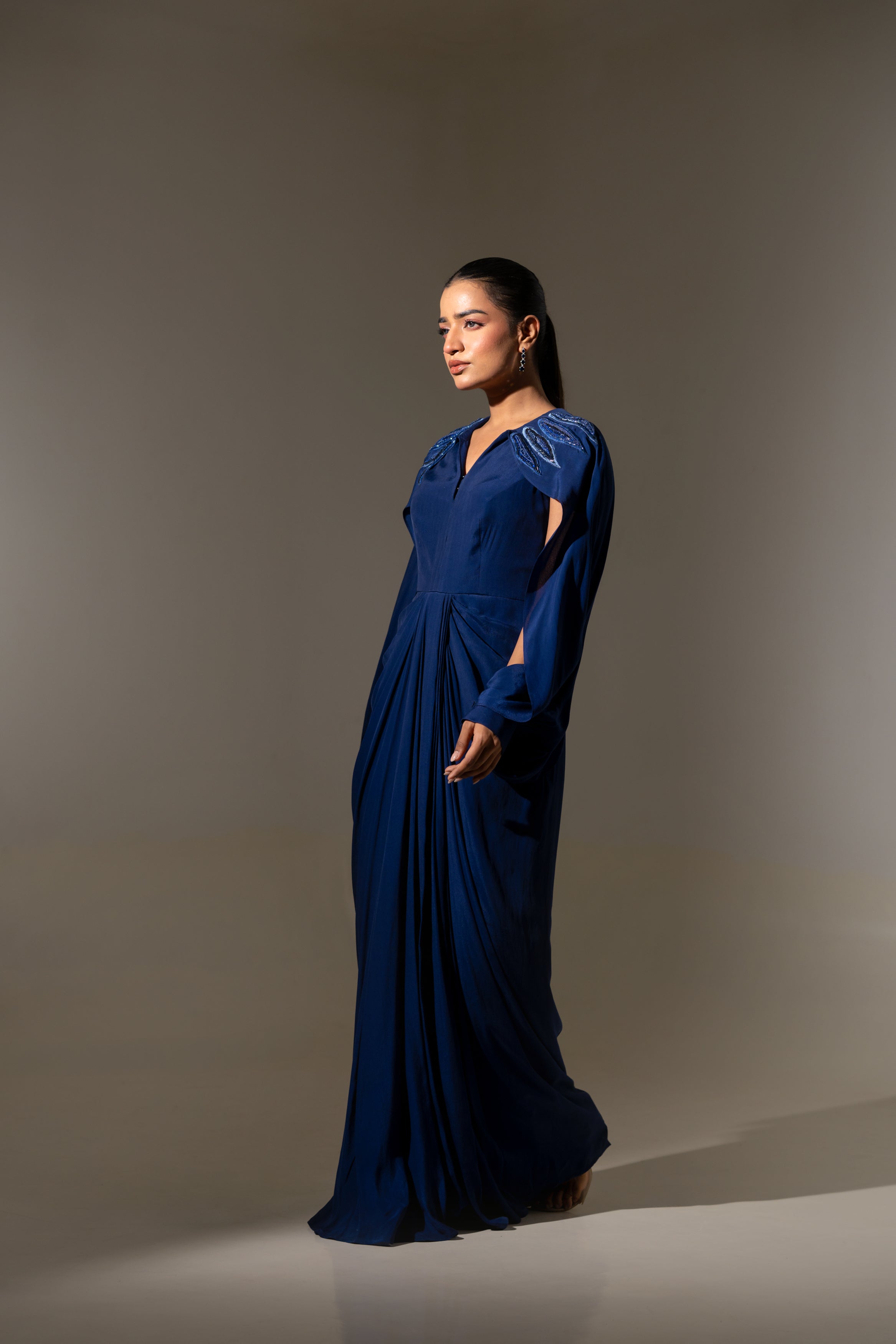 BLUE EMBELLISHED SHOULDER DRAPED GOWN