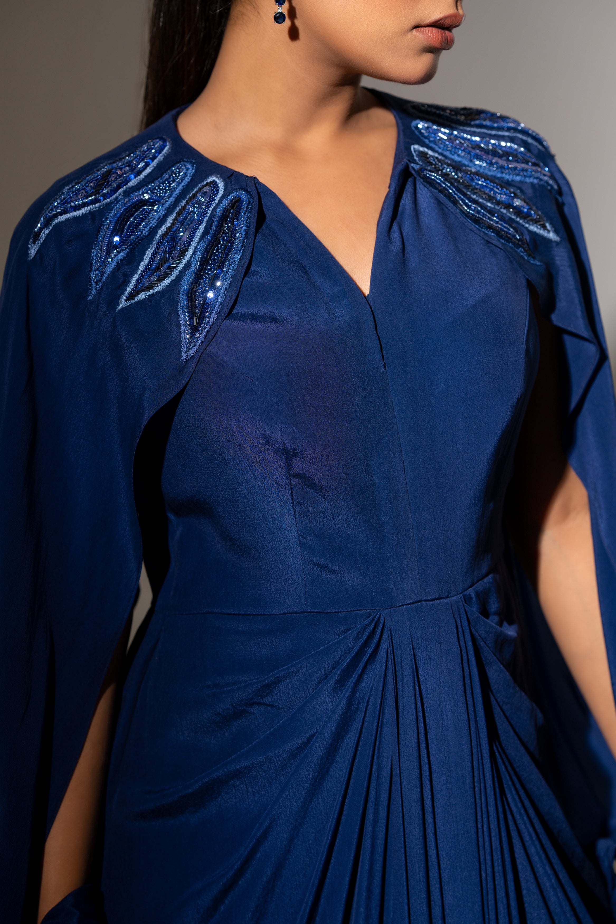 BLUE EMBELLISHED SHOULDER DRAPED GOWN