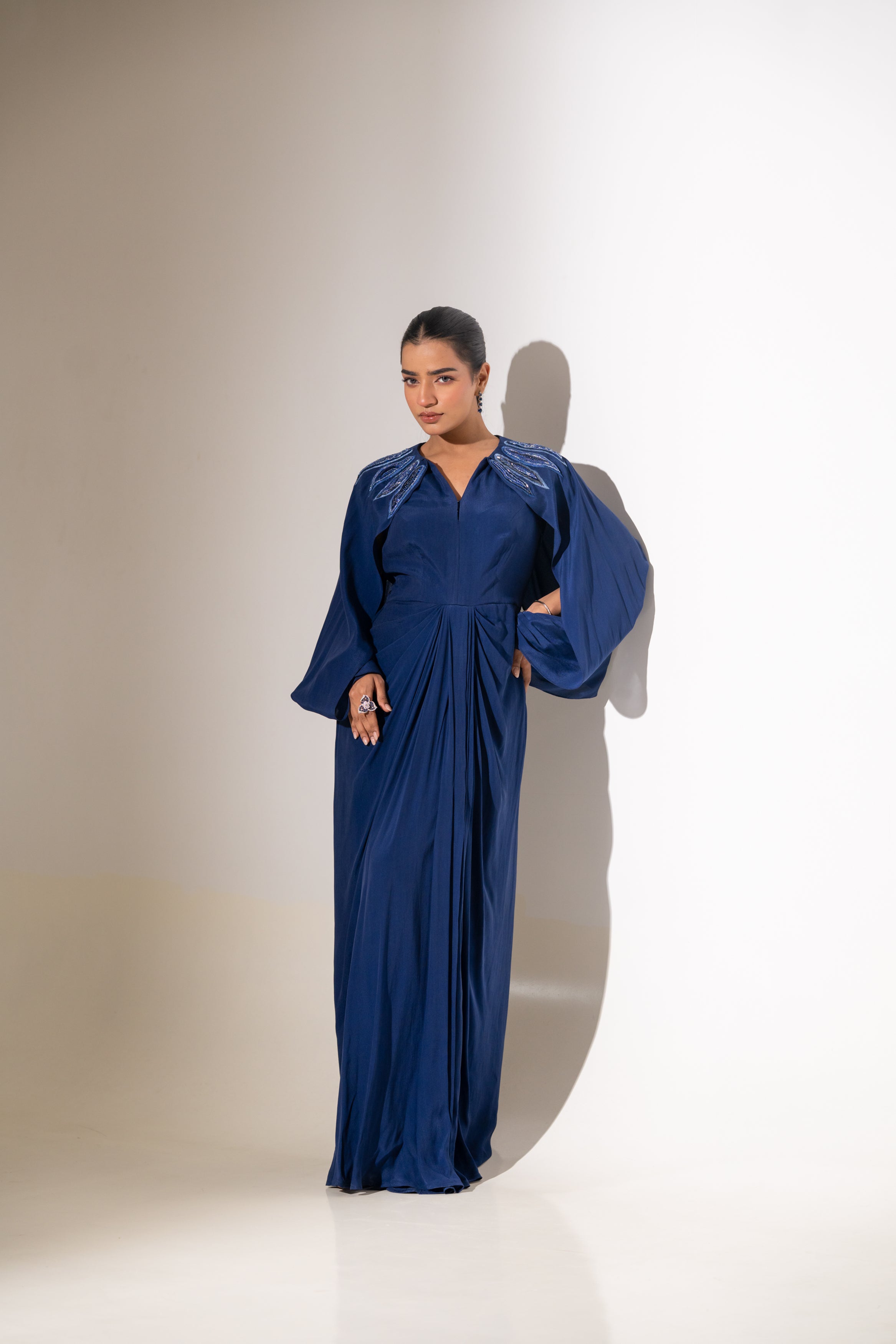 BLUE EMBELLISHED SHOULDER DRAPED GOWN
