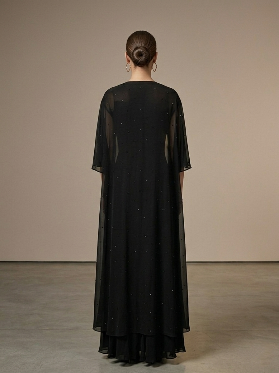 BLACK CORSET CAPE SET WITH FISH CUT SKIRT.