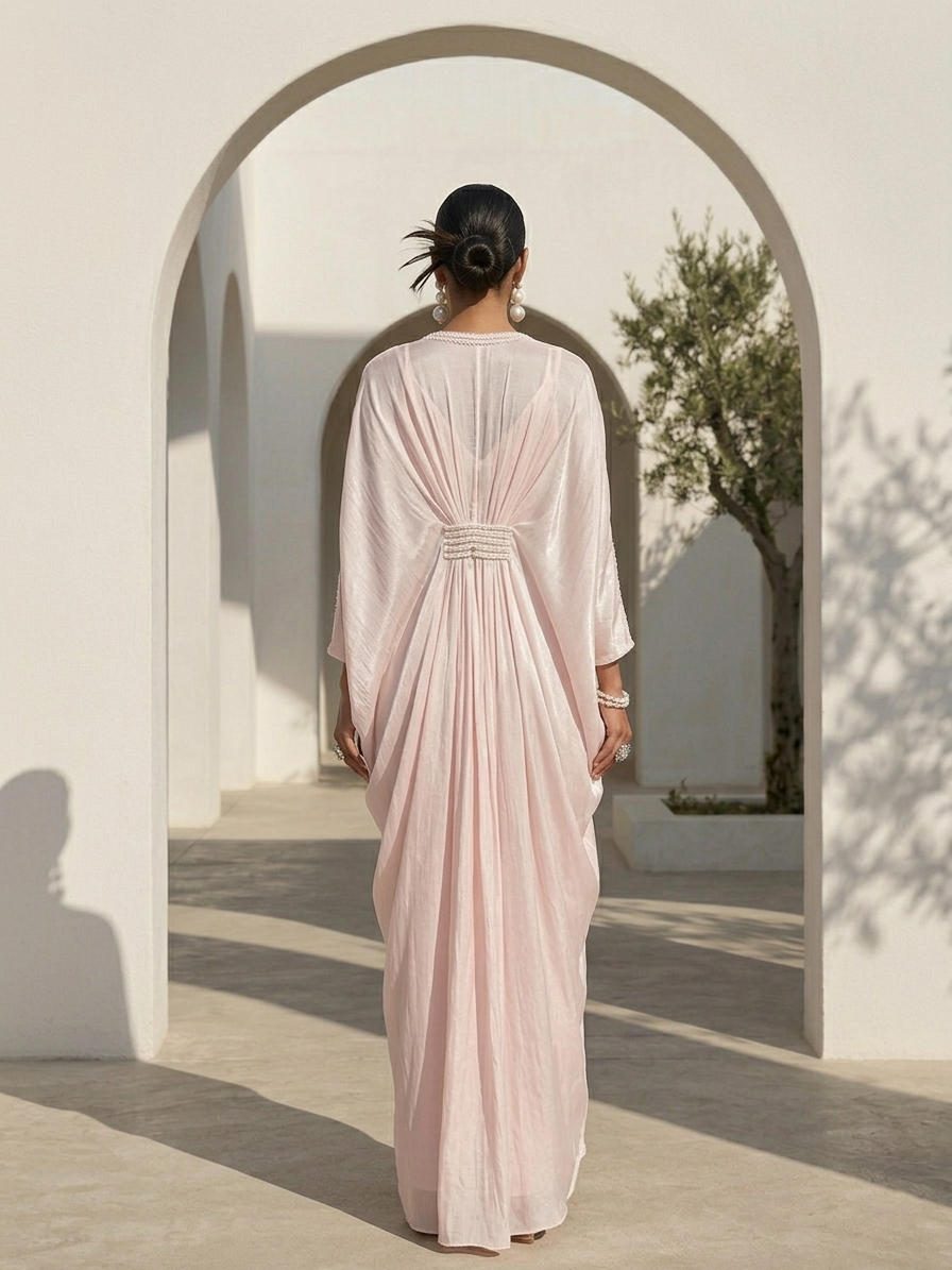 ONION PINK KAFTAN WITH EMBROIDERED NECKLINE WAIST AND SLEEVES.