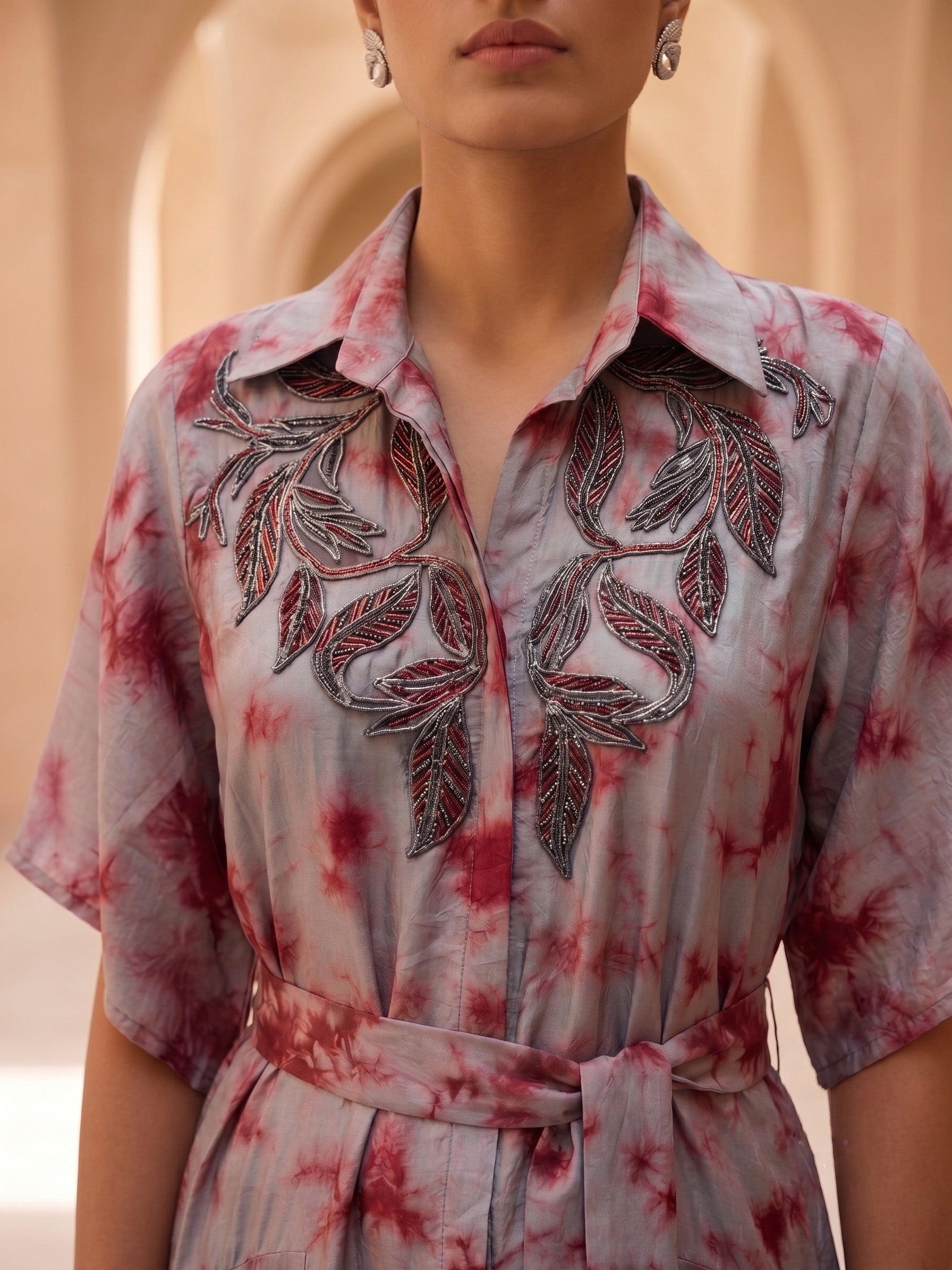 STYLISH  DRESS WITH ELEGANT WIRE EMBROIDERY ON THE FRONT.