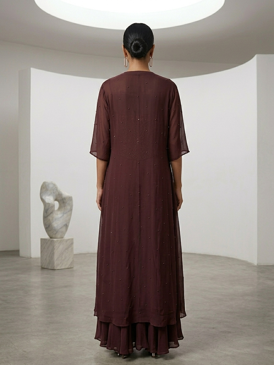 BROWN CORSET  CAPE SET WITH  FISH CUT SKIRT.