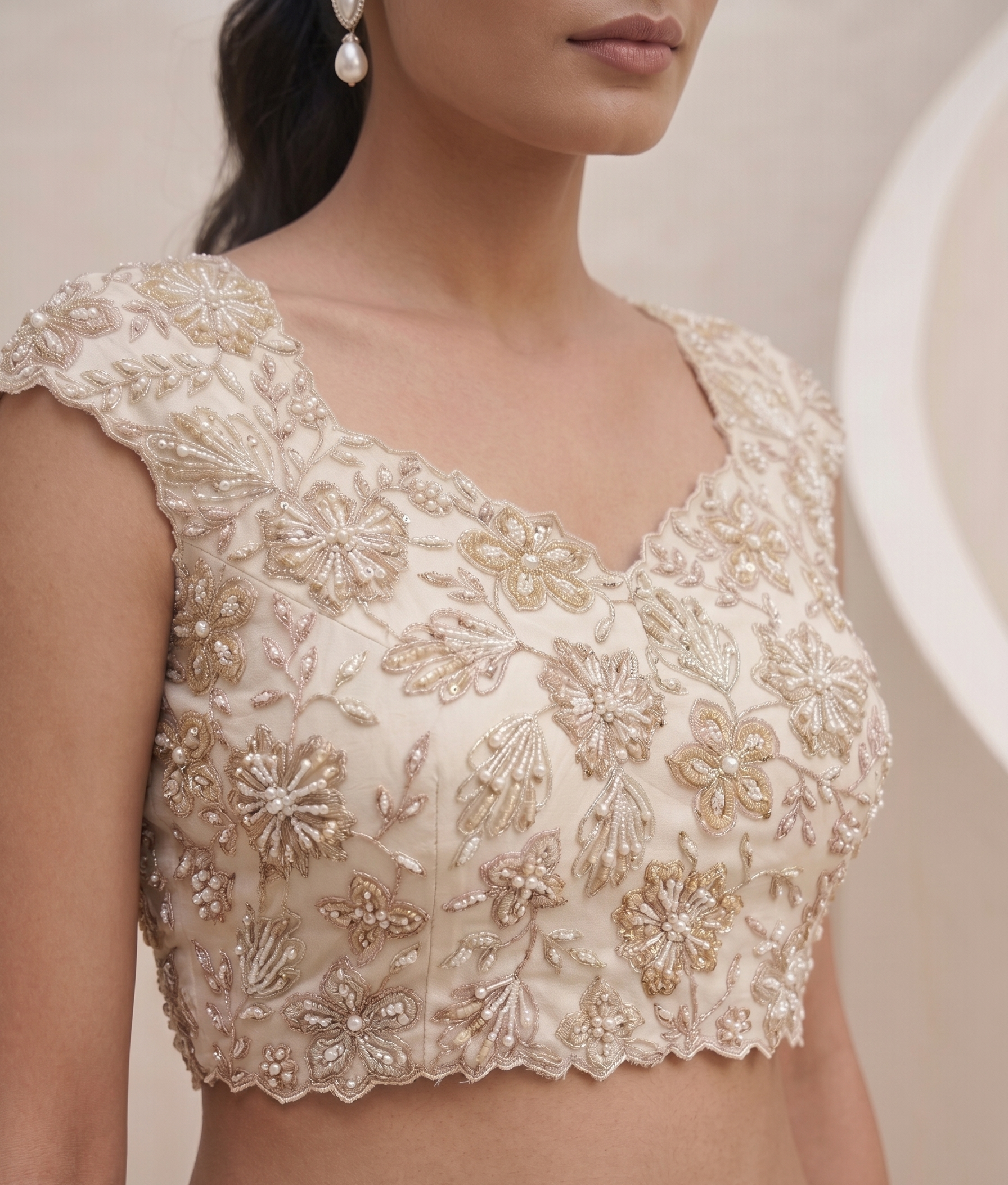 OFF WHITE DRAPE SAREE WITH APPLIQUE FLORAL WORK BLOUSE.