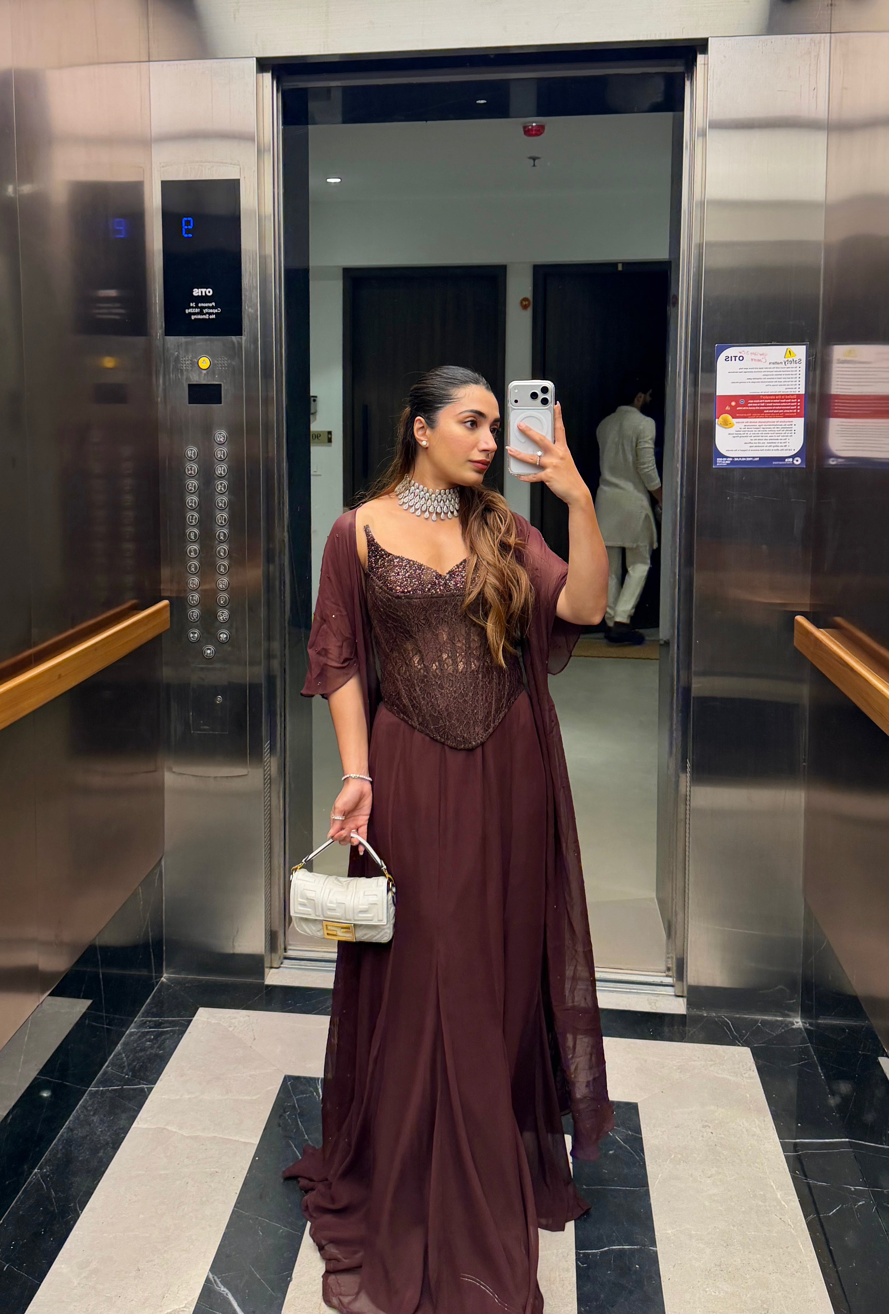 BROWN CORSET  CAPE SET WITH  FISH CUT SKIRT.