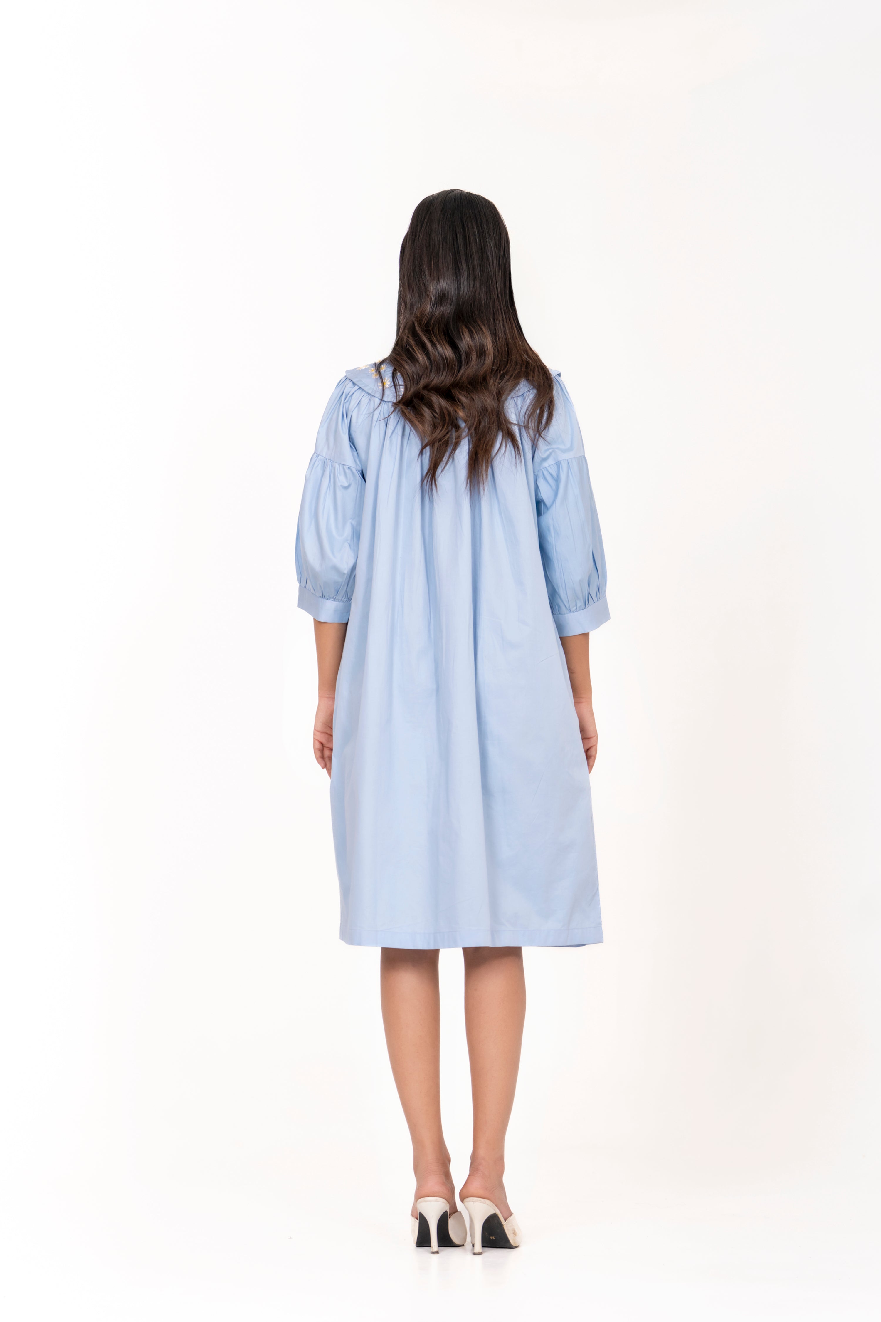 SKY BLUE EMBROIDERED DRESS WITH FLORAL DETAILING AND PUFFED SLEEVES.