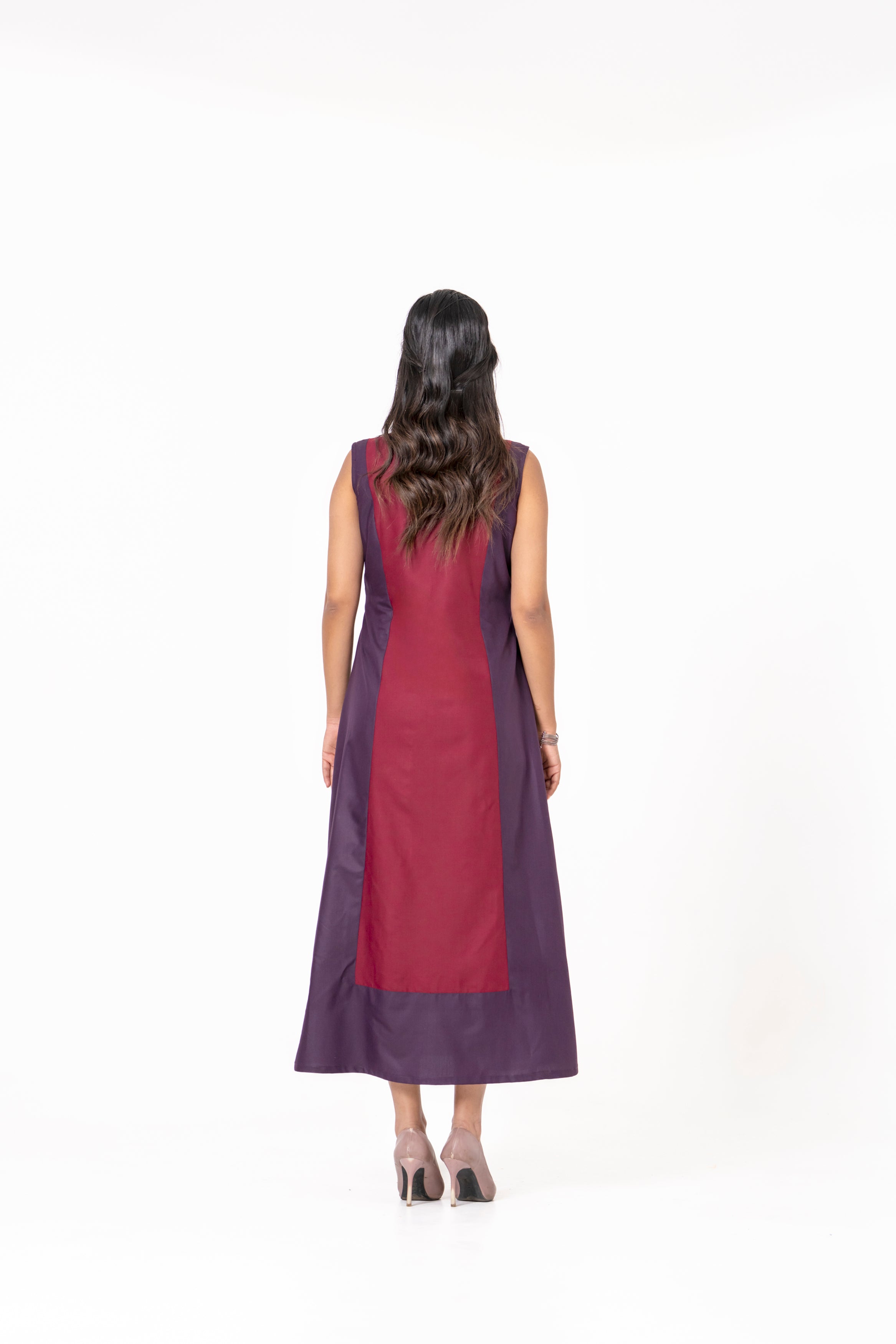 WINE AND MAROON SLEEVELESS A-LINE DRESS WITH FLORAL EMBROIDERED PANEL.