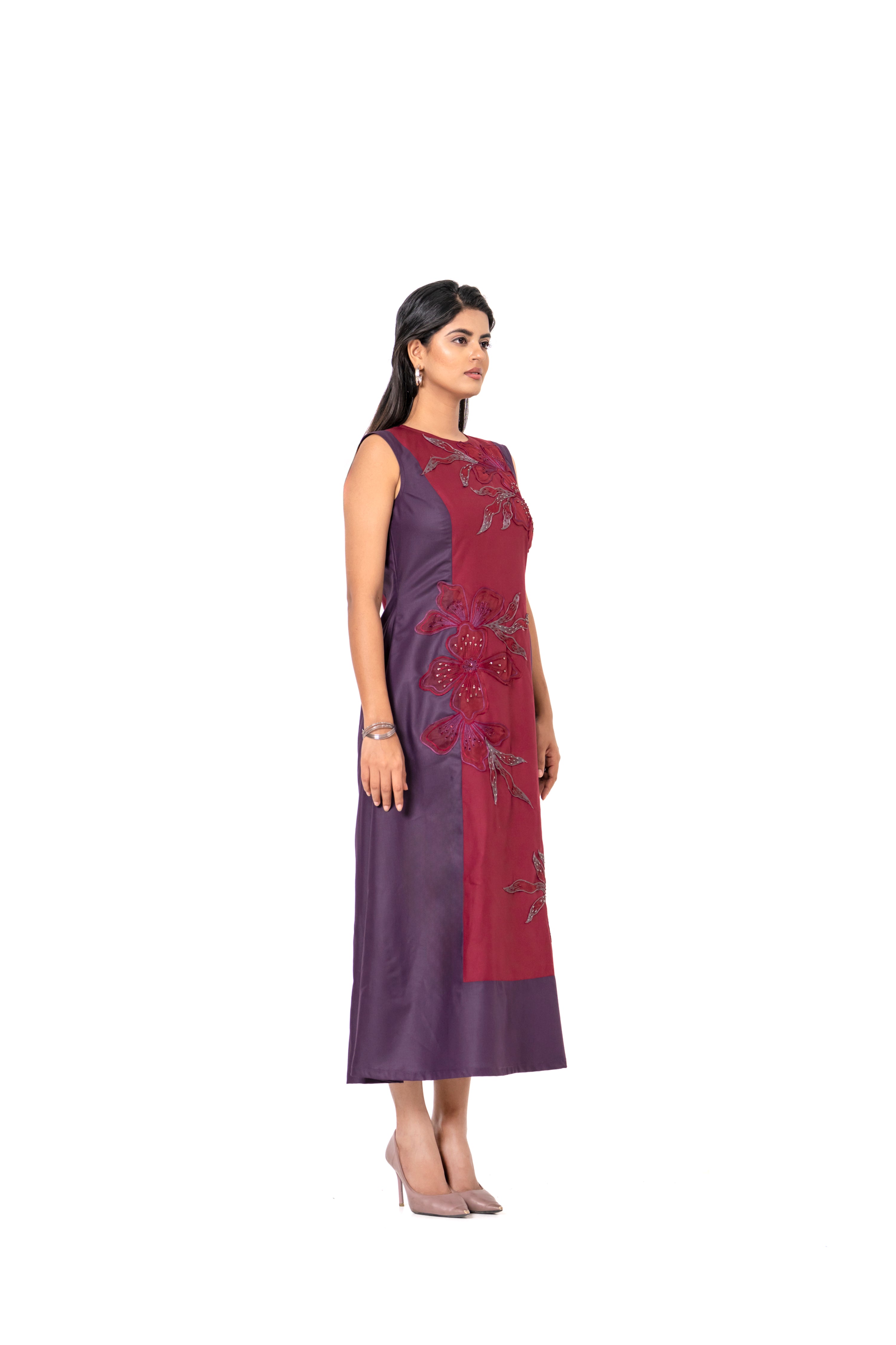 WINE AND MAROON SLEEVELESS A-LINE DRESS WITH FLORAL EMBROIDERED PANEL.