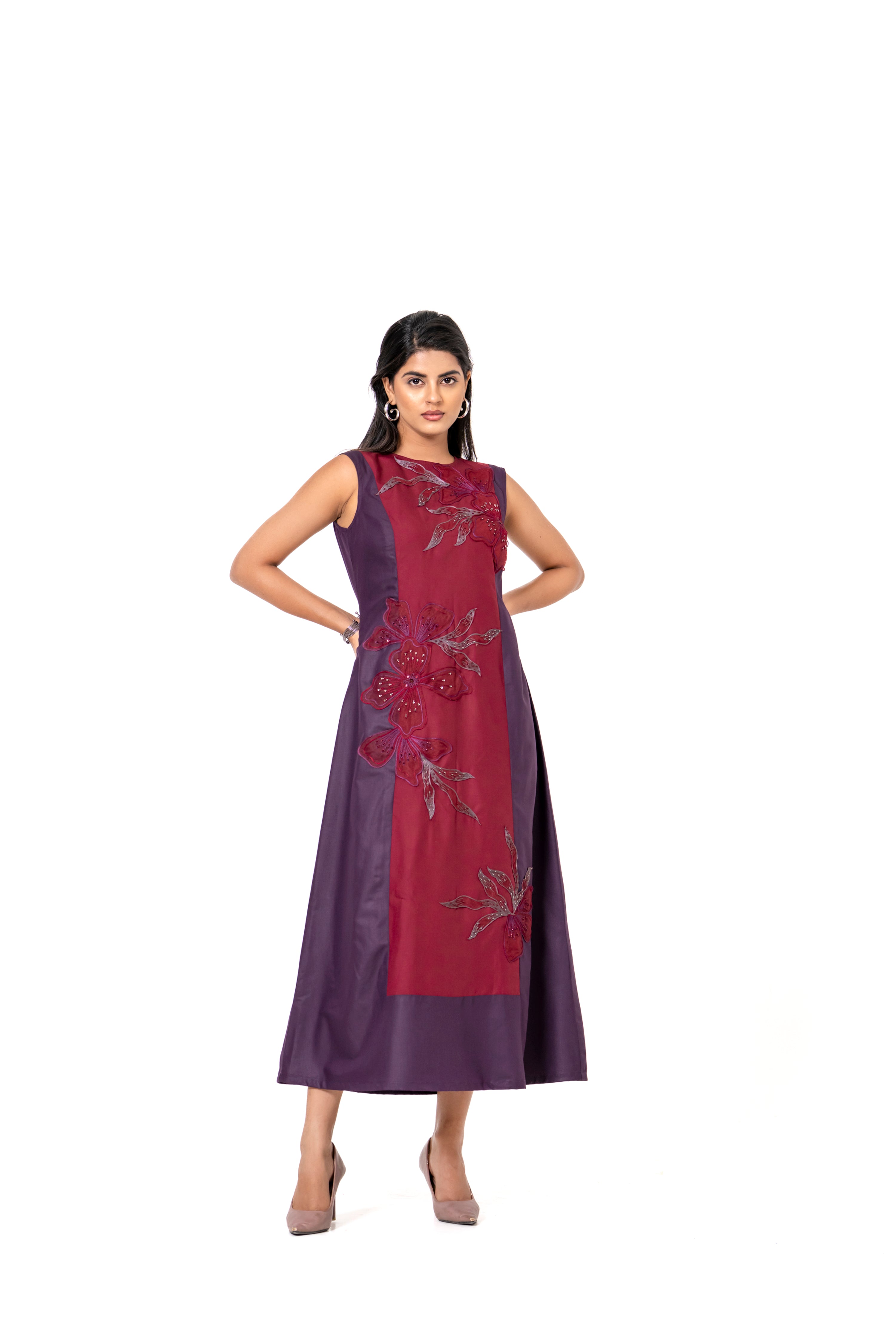 WINE AND MAROON SLEEVELESS A-LINE DRESS WITH FLORAL EMBROIDERED PANEL.
