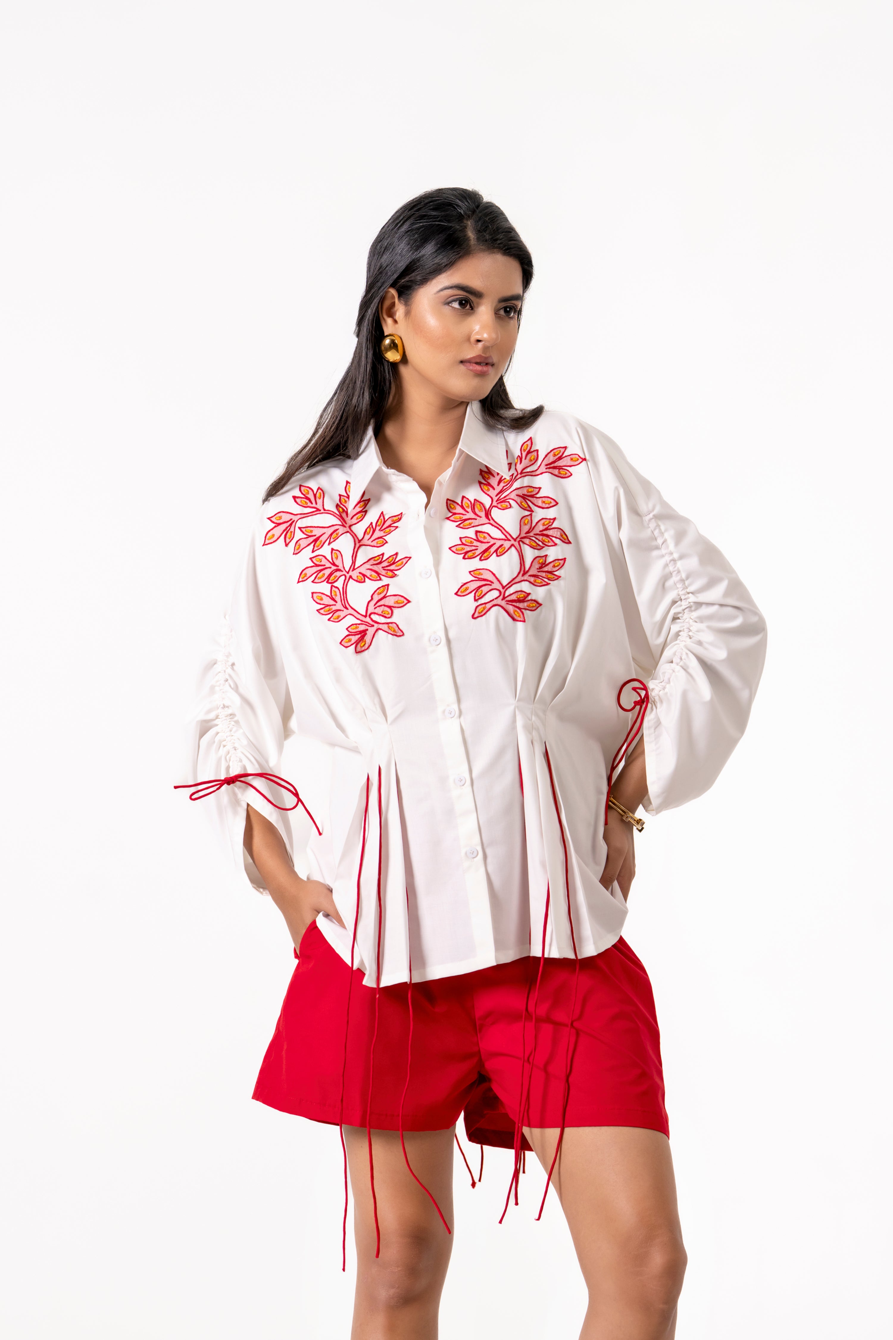 WHITE EMBROIDERED SHIRT WITH RED SHORTS – CHIC FUSION LOOK.