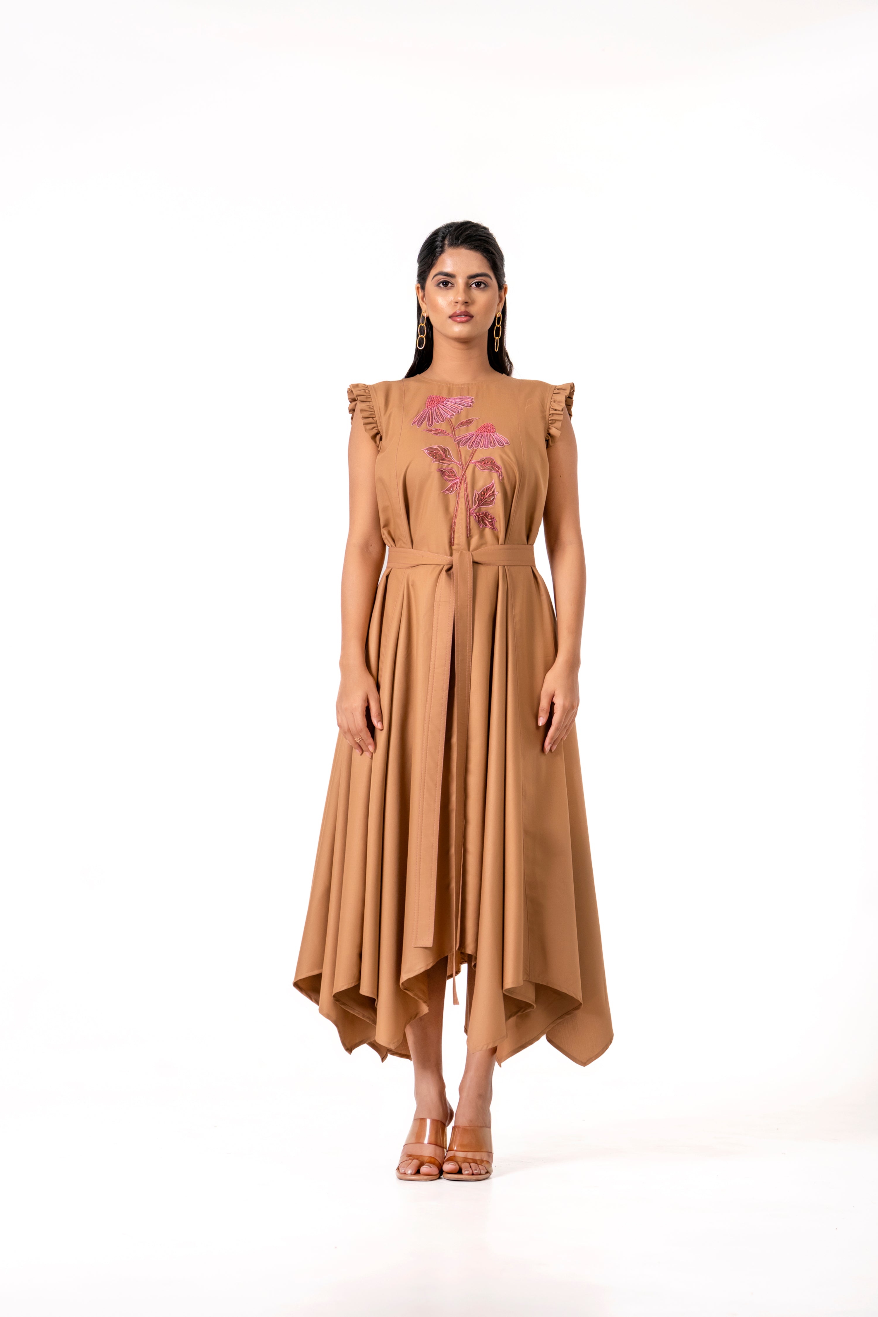 BEIGE HANDKERCHIEF HEM DRESS WITH FLORAL EMBROIDERY.