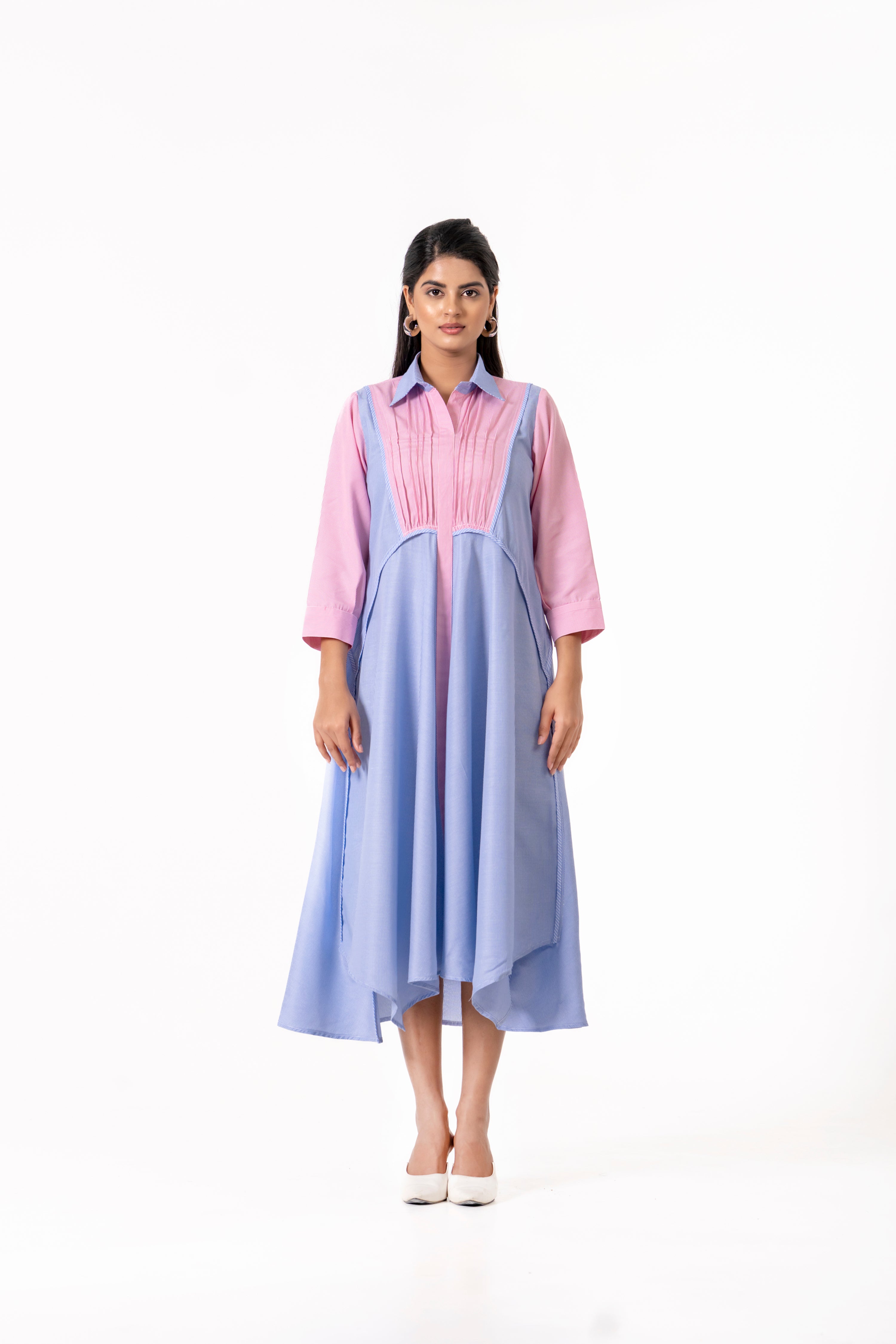PINK AND BLUE LAYERED DRESS WITH MINIMAL FRONT DETAILING.