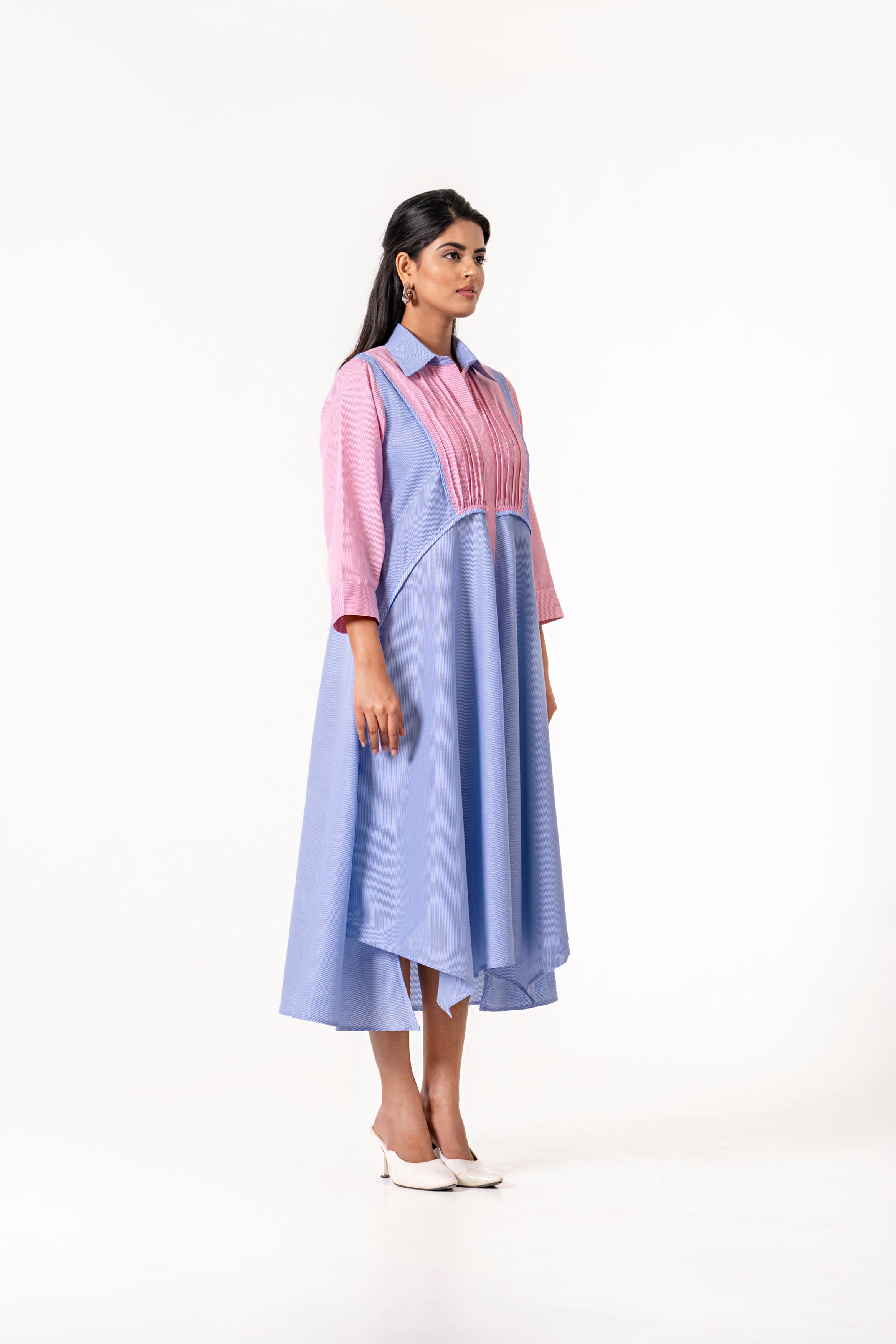 PINK AND BLUE LAYERED DRESS WITH MINIMAL FRONT DETAILING.