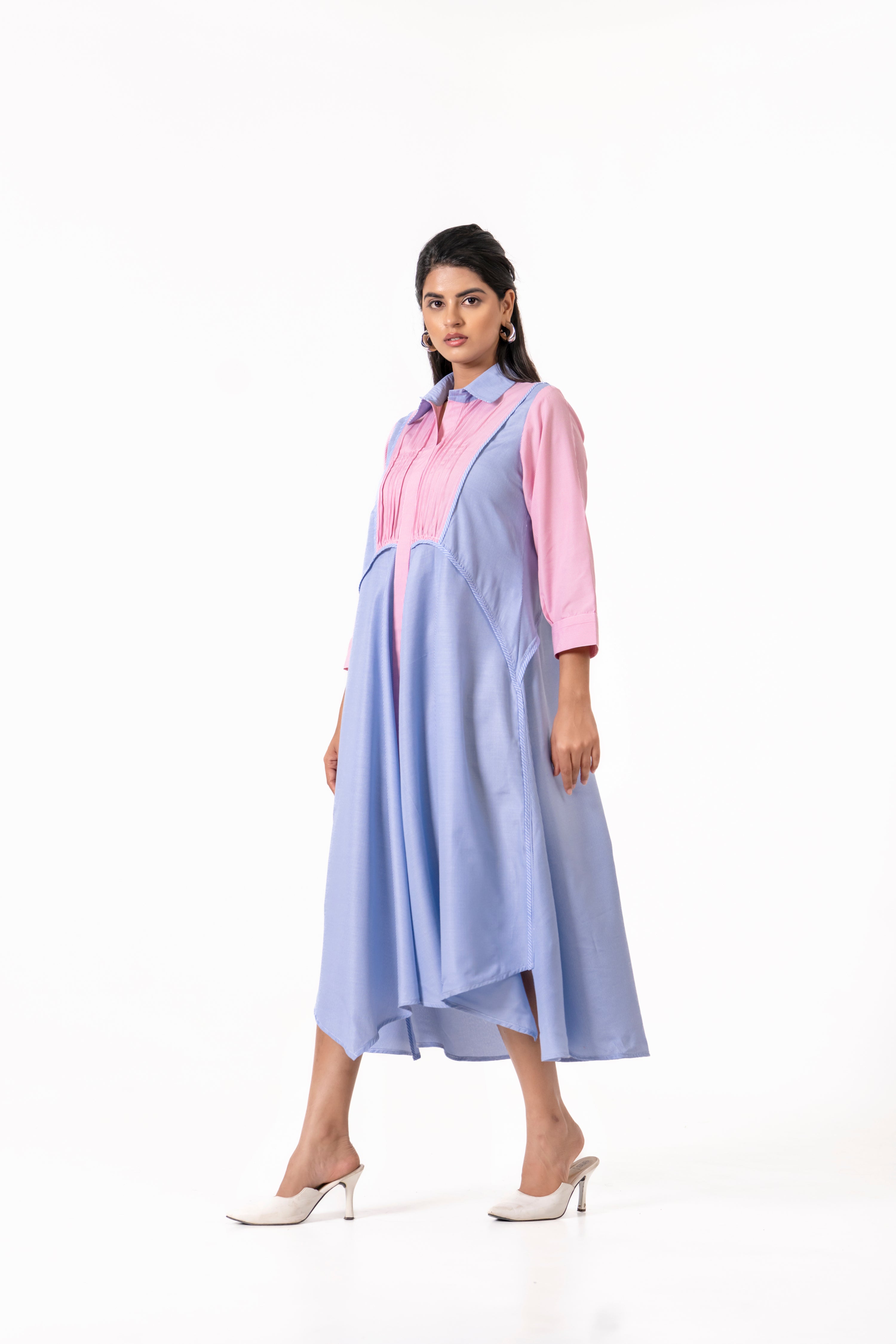 PINK AND BLUE LAYERED DRESS WITH MINIMAL FRONT DETAILING.