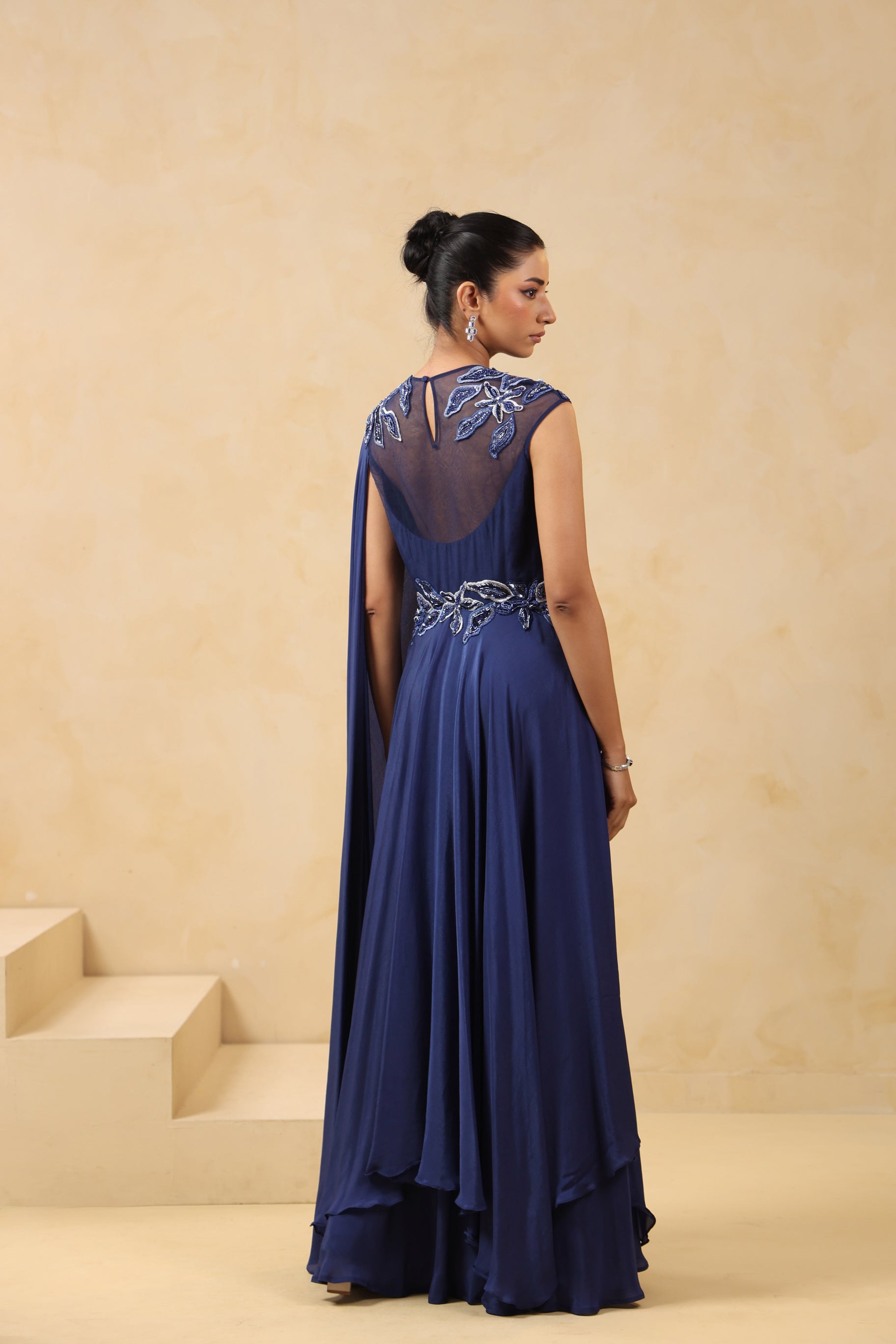 ROYAL BLUE DRAPED SAREE GOWN WITH APPLIQUE EMBROIDERY.