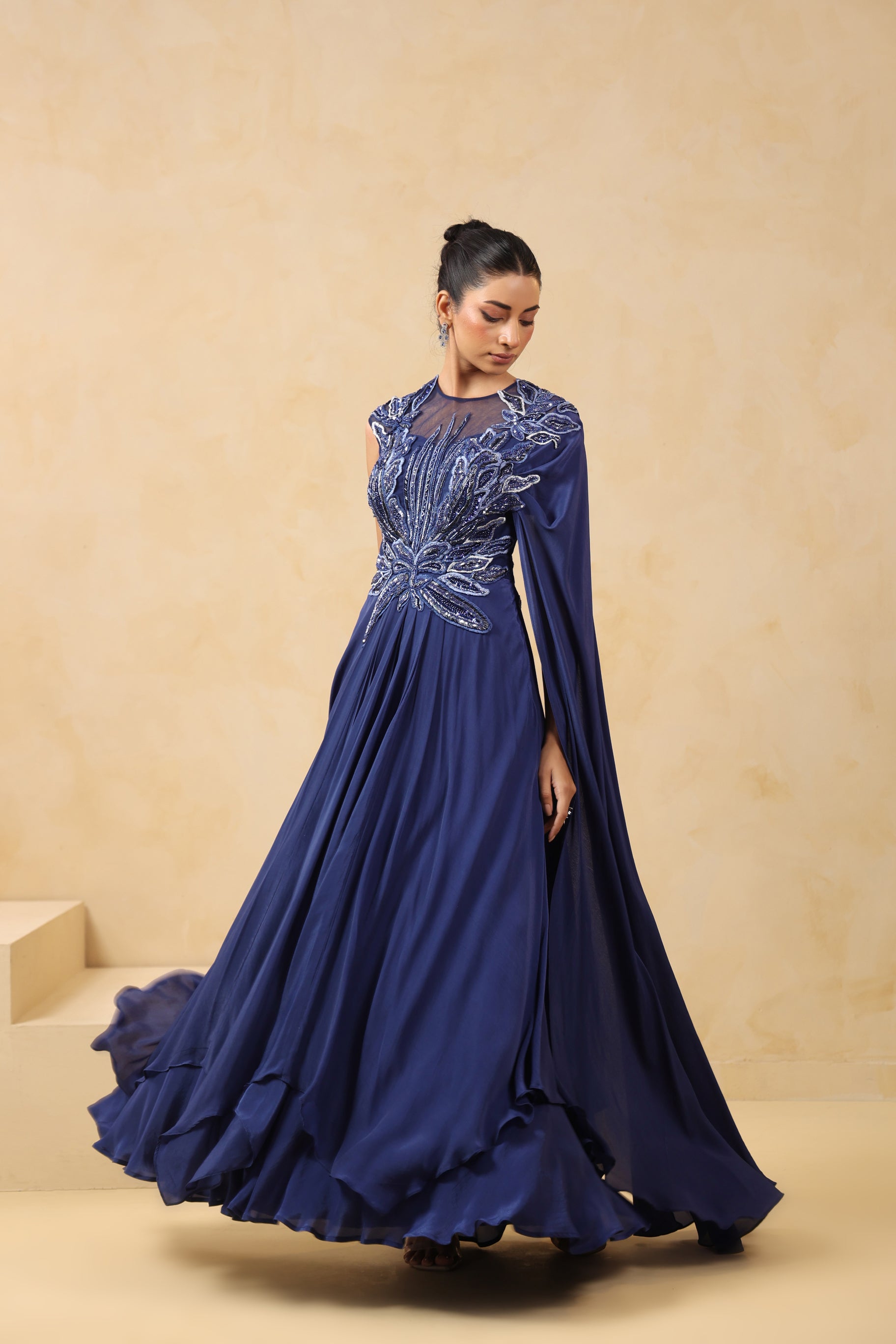 ROYAL BLUE DRAPED SAREE GOWN WITH APPLIQUE EMBROIDERY.