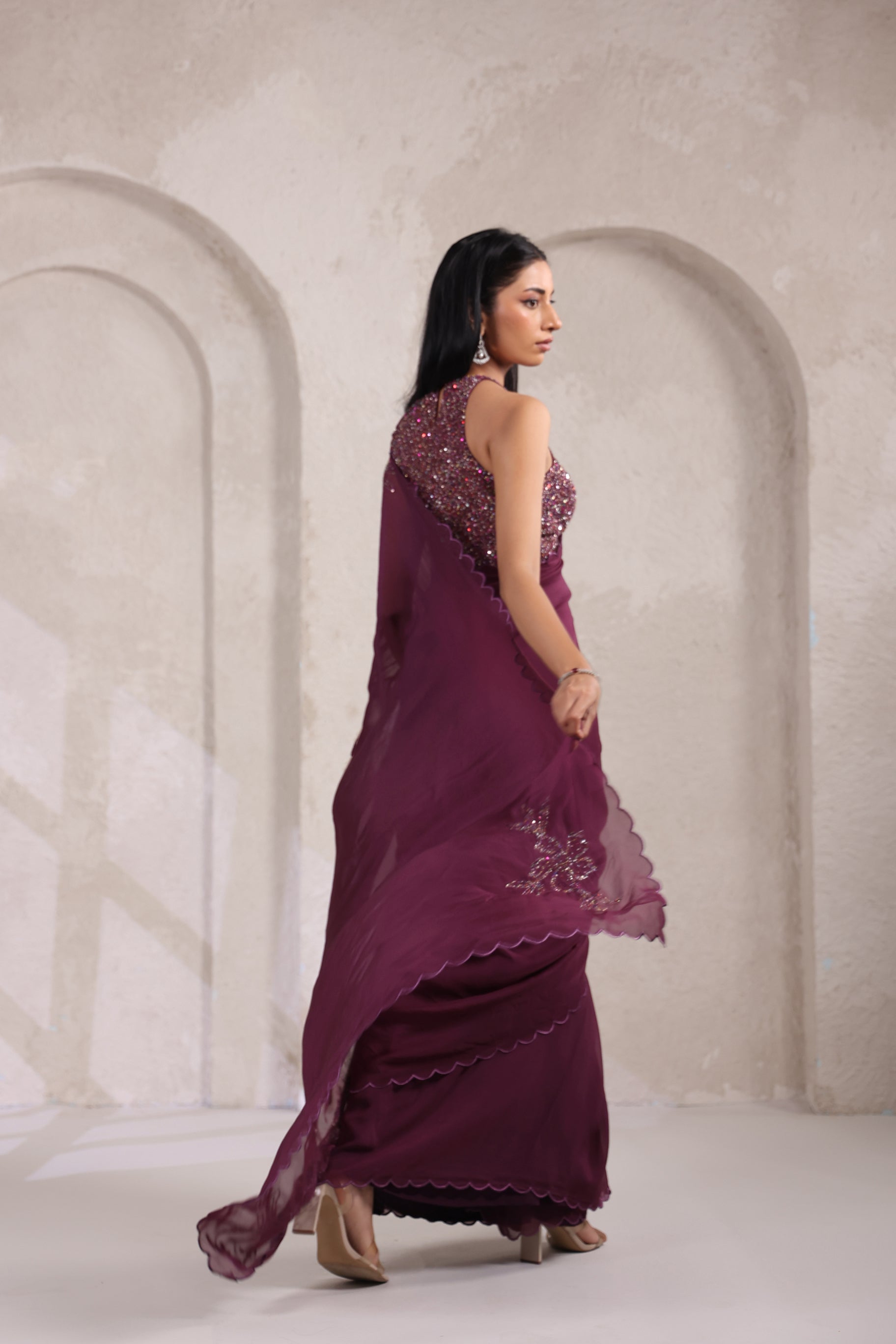 GRACEFUL WINE SAREE WITH INTRICATE SEQUIN.