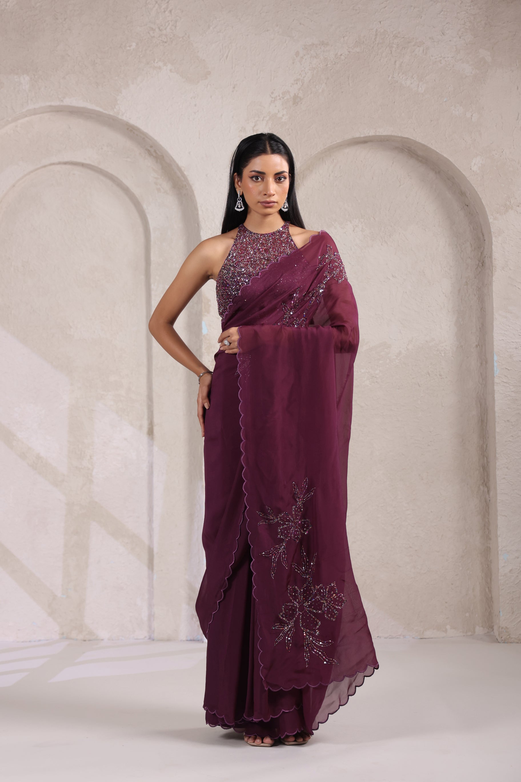 GRACEFUL WINE SAREE WITH INTRICATE SEQUIN.