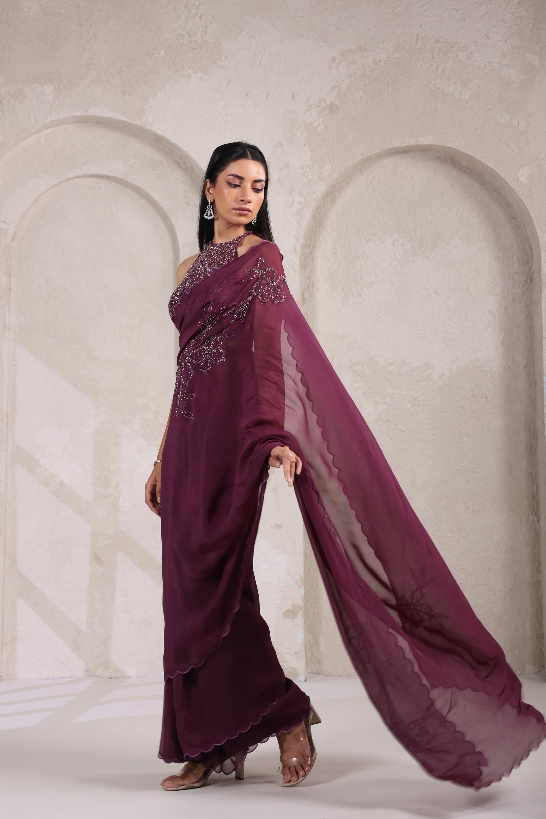 GRACEFUL WINE SAREE WITH INTRICATE SEQUIN.