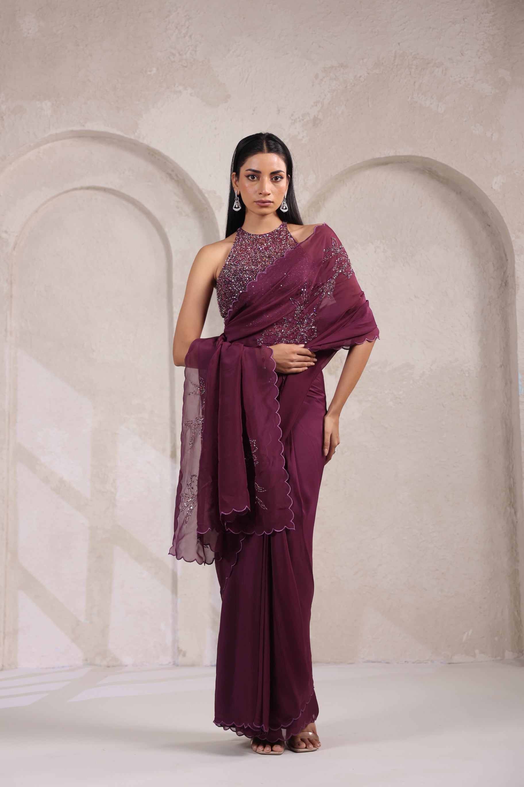 GRACEFUL WINE SAREE WITH INTRICATE SEQUIN.