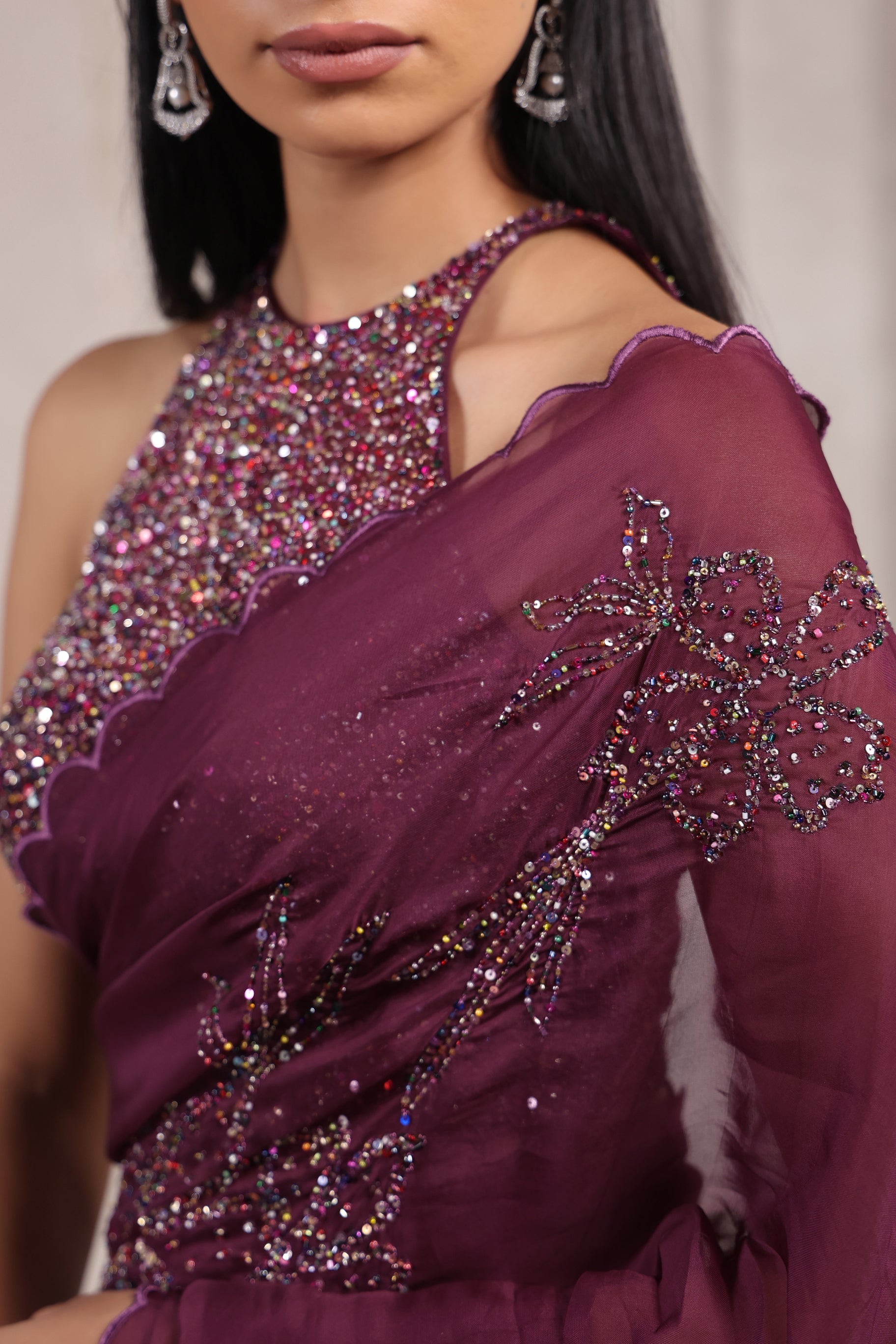 GRACEFUL WINE SAREE WITH INTRICATE SEQUIN.