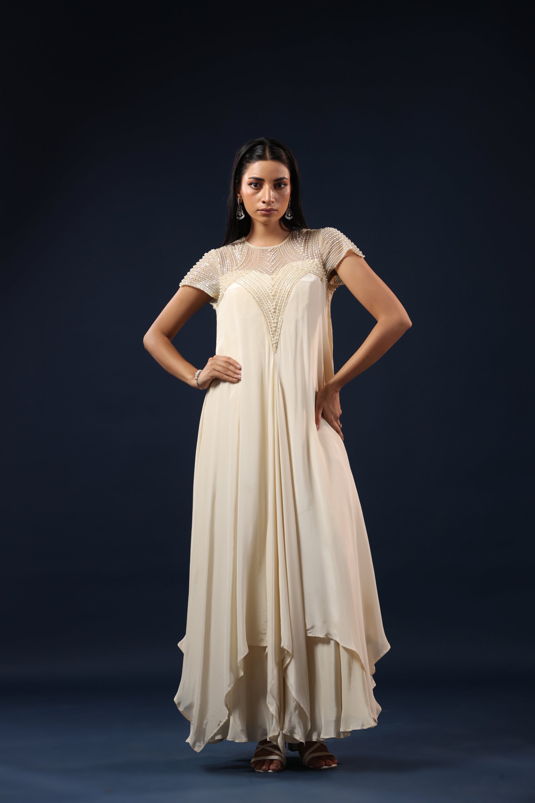 IVORY PEARL EMBELLISHED GOWN.