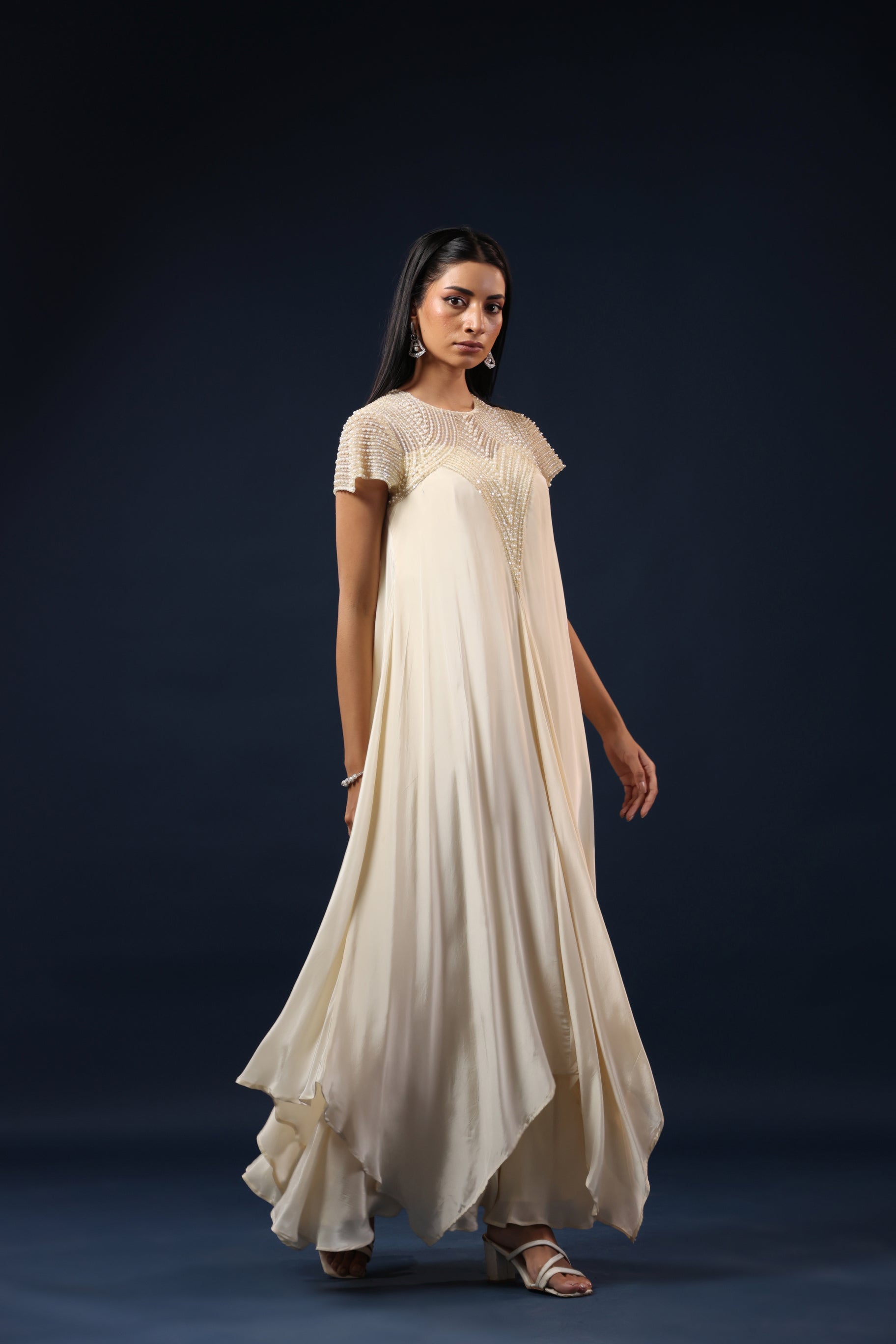 IVORY PEARL EMBELLISHED GOWN.