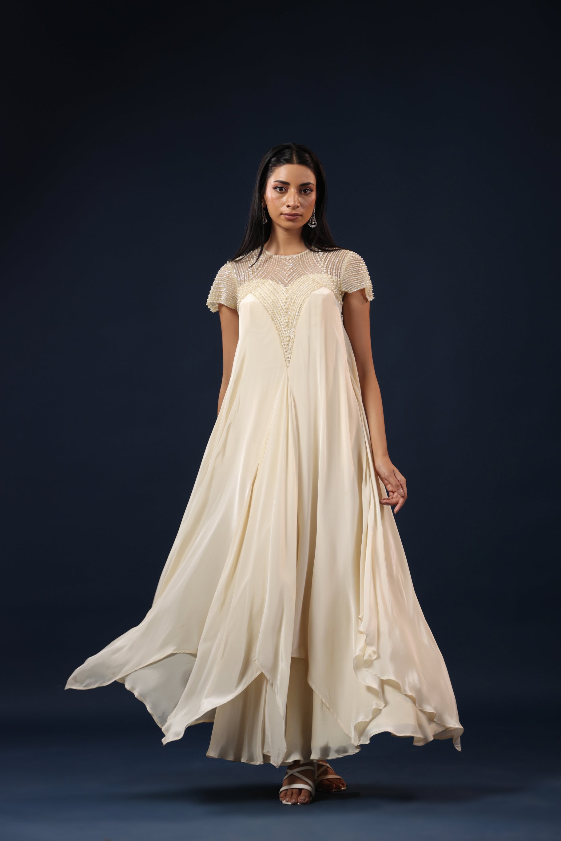 IVORY PEARL EMBELLISHED GOWN.