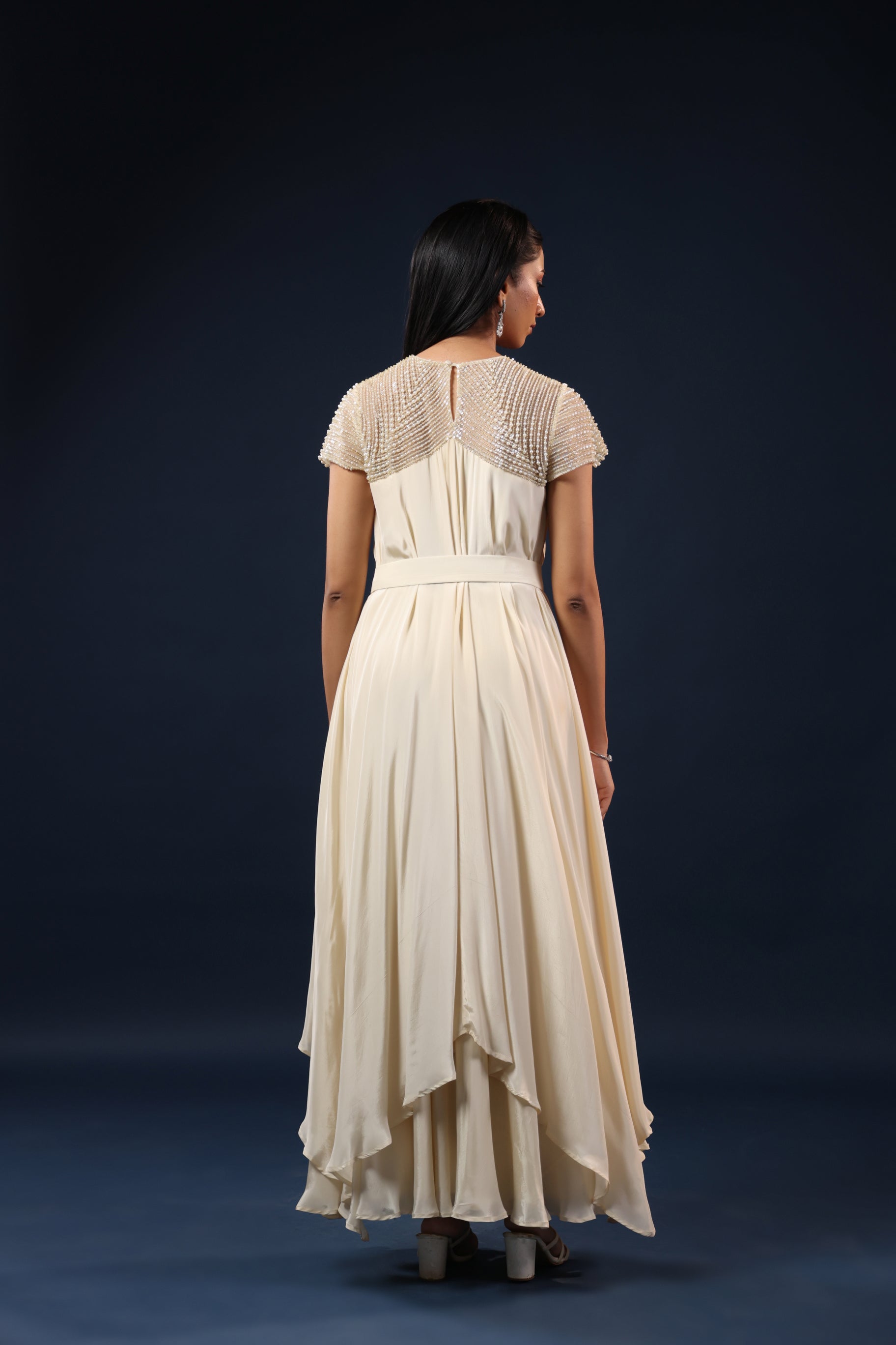 IVORY PEARL EMBELLISHED GOWN.
