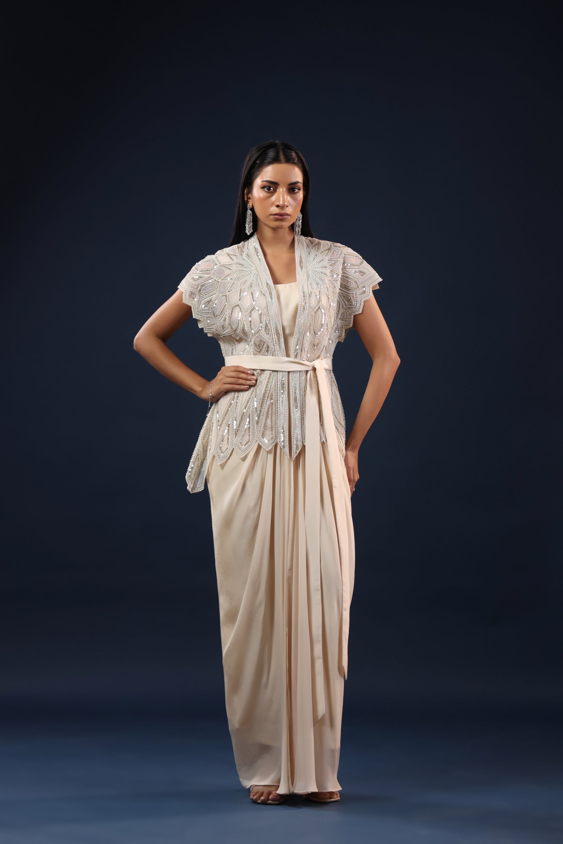 OFF WHITE SKIRT & TOP WITH EMBELLISHED BELTED JACKET.