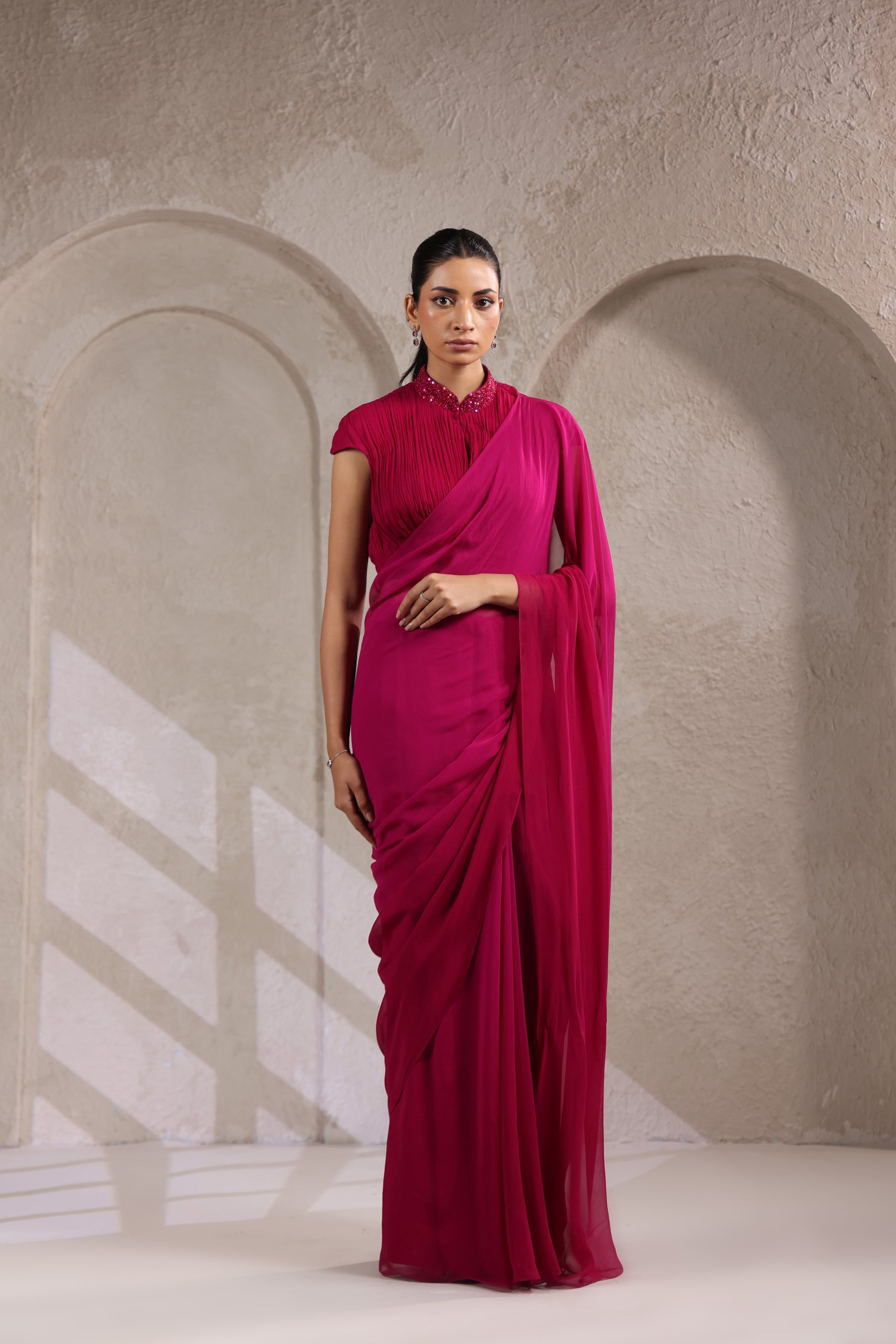 MAGENTA PINK OMBRE GEORGETTE SAREE WITH PLEATED HIGH NECK BLOUSE.
