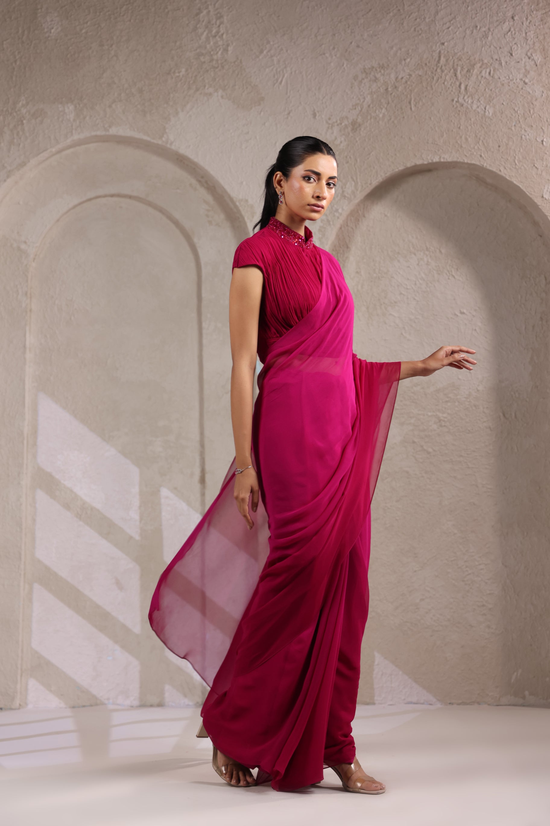 MAGENTA PINK OMBRE GEORGETTE SAREE WITH PLEATED HIGH NECK BLOUSE.